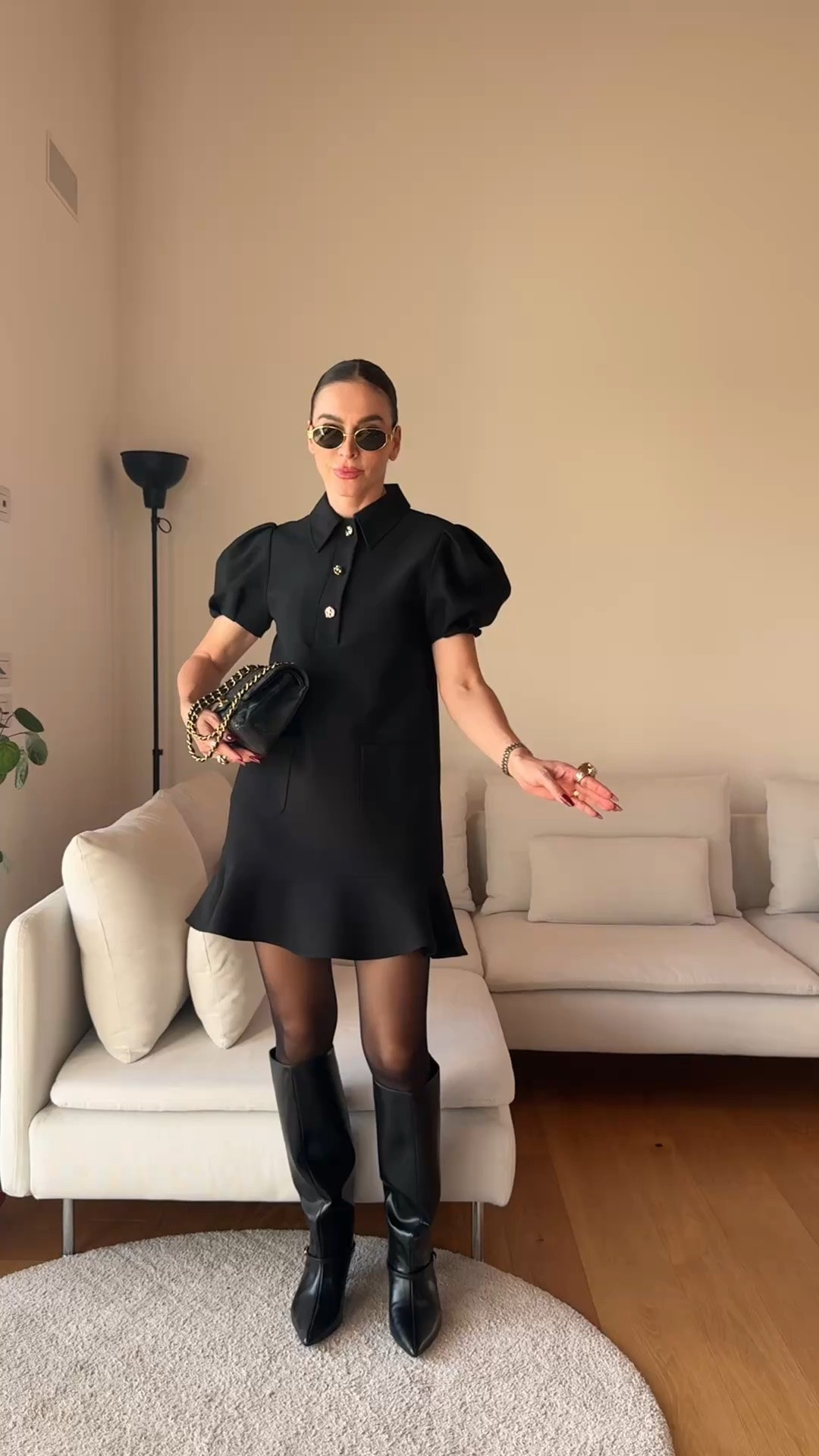 This Zara little black dress is such a dress-to-impress piece.

I’m 173 cm, 5’8”, and wearing Size S. I usually wear EU 36, UK 8, US 4.

It has a lapel collar, short puff sleeves with pleated details, front patch pockets, a ruffled hem and gold-tone buttons down the front.

I love the contrast between the structured top and the softer ruffle detail.

Wear it with tall boots and a coat for fall, ballerinas or loafers for daytime, or heels and a small bag for dinner or an event.

The gold buttons already make it feel dressed up, so you really do not need much else.

A true little black dress with personality.

🔎 Zara black dress, Zara little black dress, black mini dress, puff sleeve dress, gold button dress, dress to impress, fall black dress, autumn dress outfit, black dress with boots, black dress with ballerinas, dinner outfit women, event dress women, chic black dress, feminine fall outfit, little black dress outfit