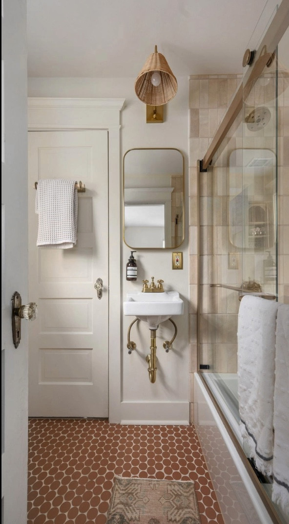 Earthy bathroom, terracotta tile, organic modern bathroom, guest bathroom design 

#LTKhome