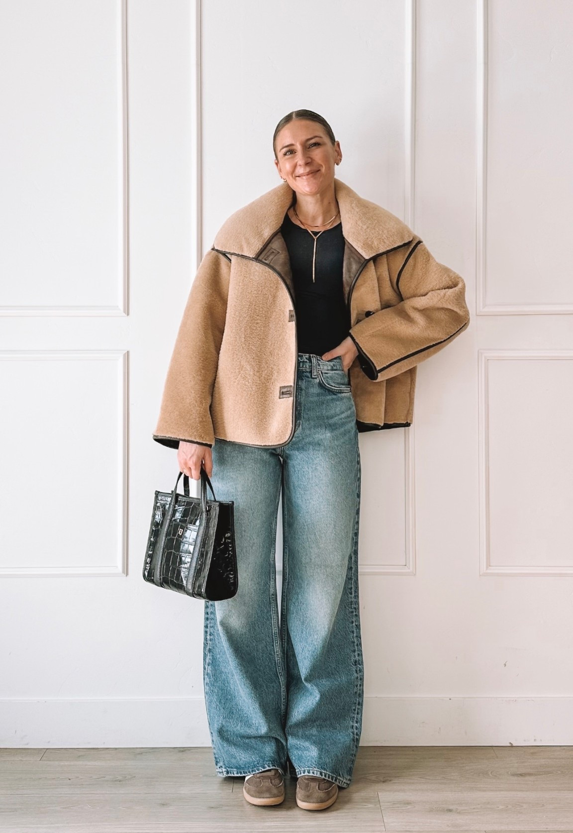 A warm shearling jacket layered over a simple black top and relaxed denim—easy, comfortable, and perfect for everyday wear.
This is the kind of Valentine look that works for errands, casual plans, or when you want to feel put together without dressing up.

#LTKmomlife #LTKootd #LTKgrwm