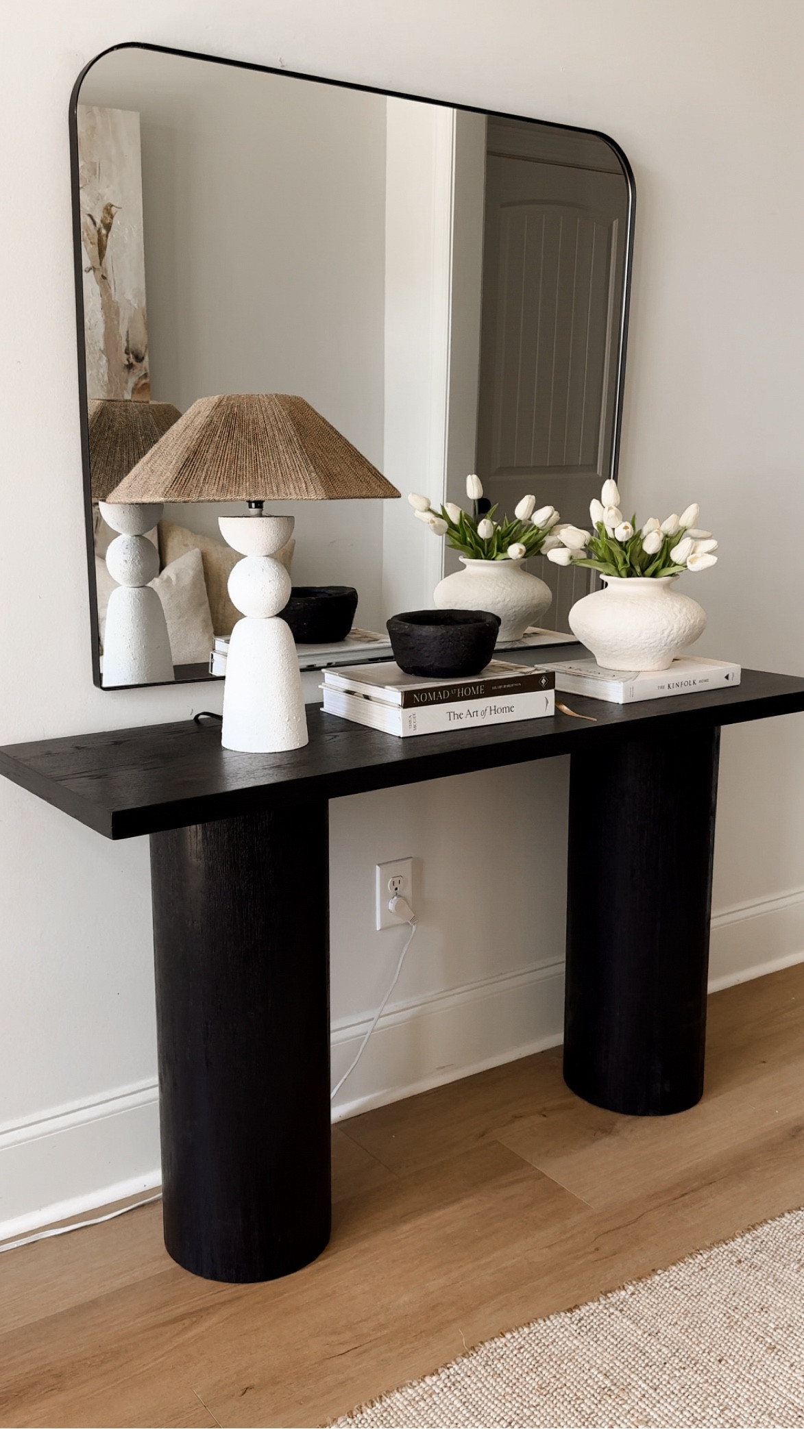 Organic modern entryway styling 🤎

I LOVEEE this new lamp I got!! The jute texture, the height. It’s all so dang good!

Narrow entryway table 
Black console table
Vintage antique finds
Tulips
Faux flowers
Organic modern styling
Affordable decor
Styling books

#LTKHome