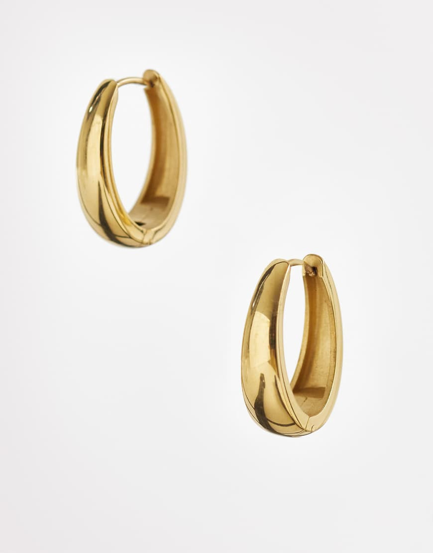 ASOS DESIGN waterproof stainless steel hoop earrings with oval design in gold tone | ASOS (Global)