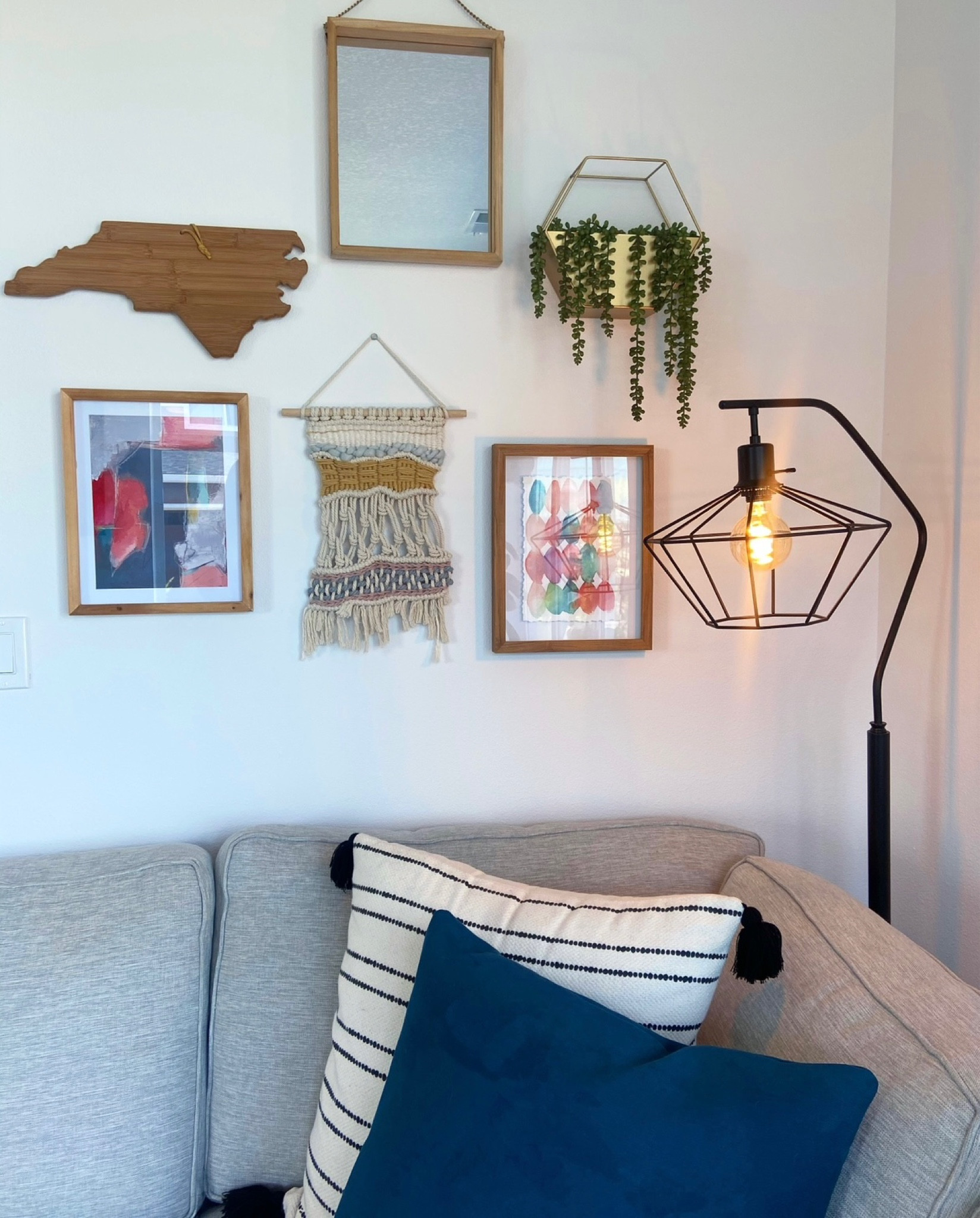 🖼️ Gallery wall tips!
1. Mix and match size and shape - the variety in size creates a random look and adds dimension. It helps guide your eye to keep looking for more! I like keeping things in the relatively same size family (these are all medium pieces around 12x12 inches) for cohesiveness, but play with mixing all kinds of pieces and shapes. Have fun with it! 

2. Add texture - adding a faux plant or knit wall hanging adds incredible dimension and a tactile element to your wall. 

3. Mix materials - I love pairing wood, metal, and glass to create a huge variety and depth to a small space. Target, World Market, Home Goods and Hobby Lobby are my favorite places to shop for wall decor. 

4. Plan your placement - I highly recommend laying your pieces out on the floor. Then you can easily move them around to find an arrangement you like. Command Strips are the GOAT for these projects…you can easily move something if you don’t like where you put it on the wall, and bonus you don’t put any holes in your wall. One day if you want to replace a piece or add something new, you can do it without damaging your wall. Flexibility = endless! 

Follow for more inspiration and projects 🔨🪴🏡