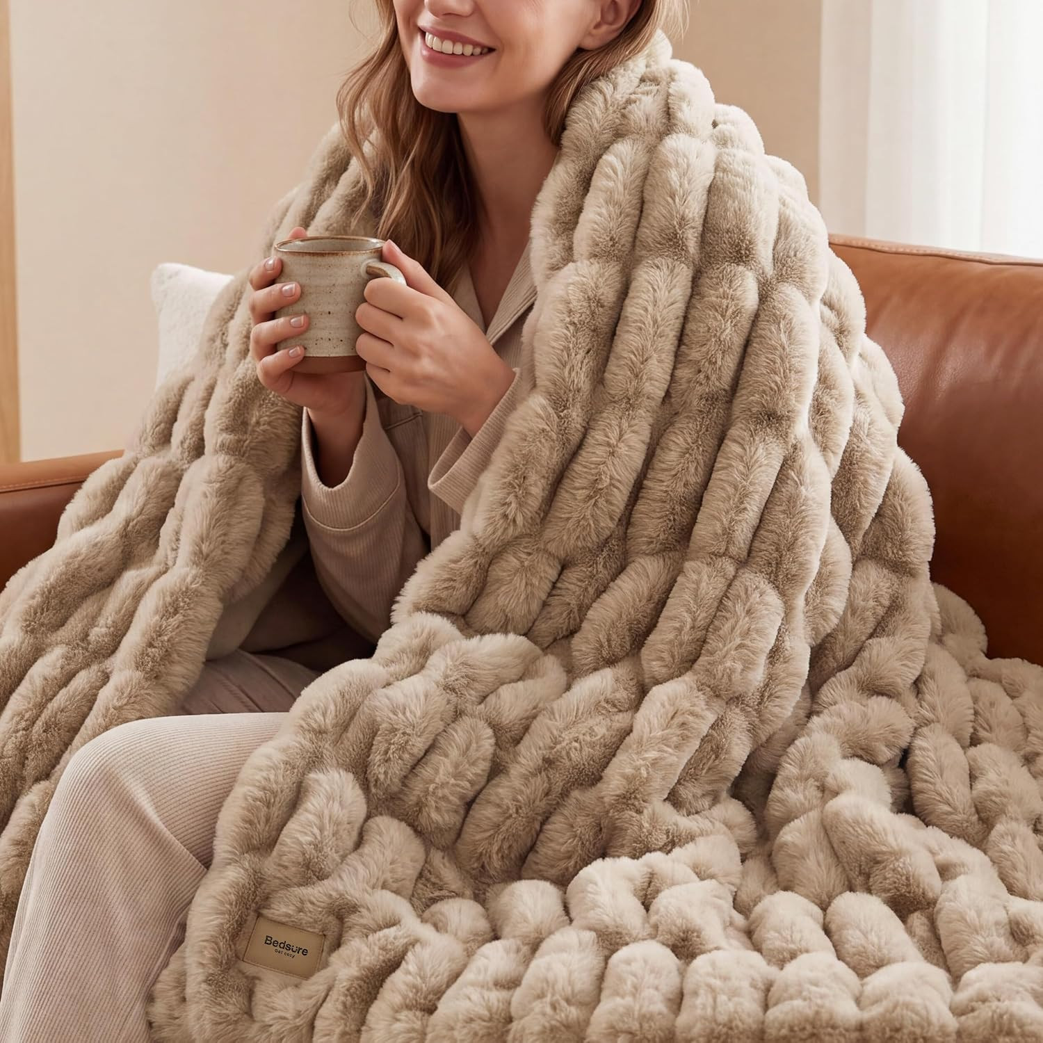 Bedsure Ultra Soft Double-Sided Faux Fur Throw Blanket for Couch, Fluffy Fuzzy Cozy Comfort Plush Thick Warm Blanket for Her, Women Men Furry Gifts, Fall Winter Sofa Chair Bed Decor, Light Brown | Amazon (US)