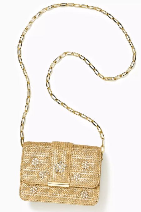 Lilly Pulitzer
Emmeline Straw Crossbody Bag

Elevate your style with the Emmeline Straw Crossbody Bag. This metallic straw bag is adorned with exquisite pearl and gem embellishments and features a chic gold metal paperclip chain crossbody strap for a touch of glamour on the go

#LTKStyleTip #LTKItBag #LTKParties