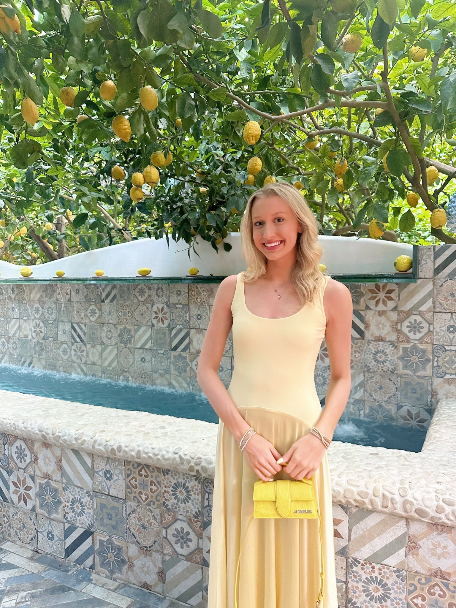 Butter yellow dress and lemon yellow bag 

#LTKStyleTip #LTKU #LTKTravel