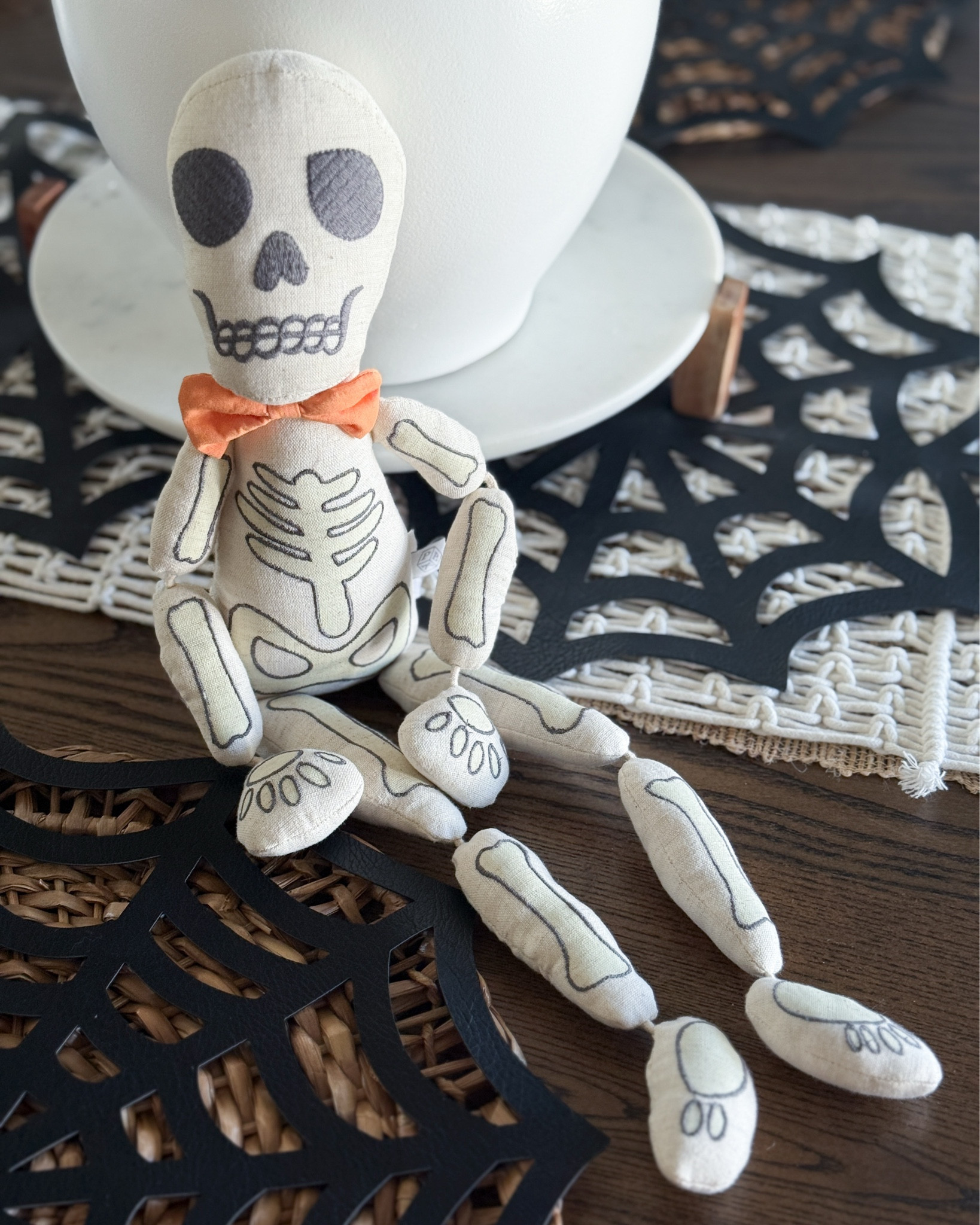I picked up the cutest tiny glow in the dark skeleton stuffed toy from Pottery Barn Kids for my youngest son’s boo basket & it couldn’t be more perfect. It’s actually the mini version of our full-size Mr. & Mrs. Bones pillows, which makes it even better. A fun, spooky (but not scary) little Halloween surprise for kids that ties in so well with our decor.

Pottery Barn Kids Halloween - glow in the dark skeleton toy - mini skeleton stuffed animal - Halloween boo basket ideas - spooky kids toys - Mr and Mrs Bones pillows - Halloween pillow decor - kids Halloween gifts - neutral Halloween decor - boo basket filler ideas

#LTKKids #LTKBaby #LTKSeasonal