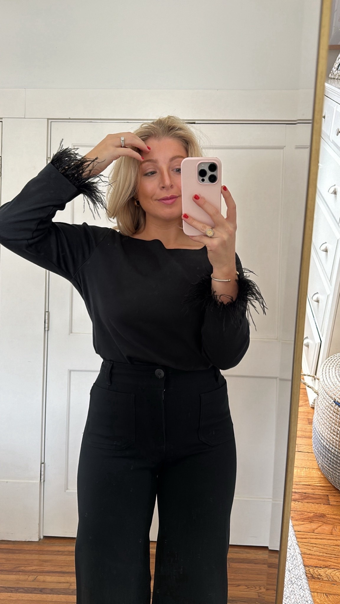 Black feather top for the holidays

#LTKgrwm #LTKHoliday #LTKootd