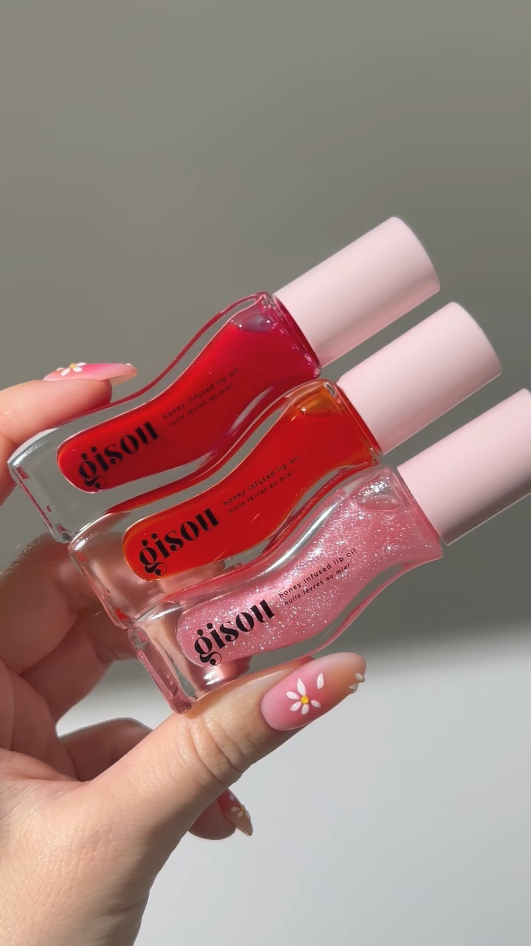 Finally, I got my hands on these gorgeous @gisou lip oils, and I am obsessed ✨ 

My favorite color is the pink, sparkly watermelon sugar, but I also love layering it with strawberry sorbet. The mango passion punch scent is the best. 

Which one do you like the most?
 (PR/gifted)

#LTKU #LTKstyletip #LTKbeauty