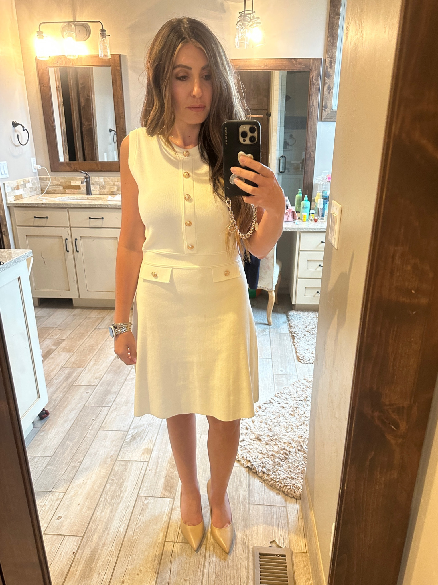 This white Amazon sheath dress with the gold button details is so flattering and easy to dress up or down. Perfect for dinners, church, showers, date nights, work or summer events. 

#LTKSeasonal #LTKWorkwear #LTKOver40