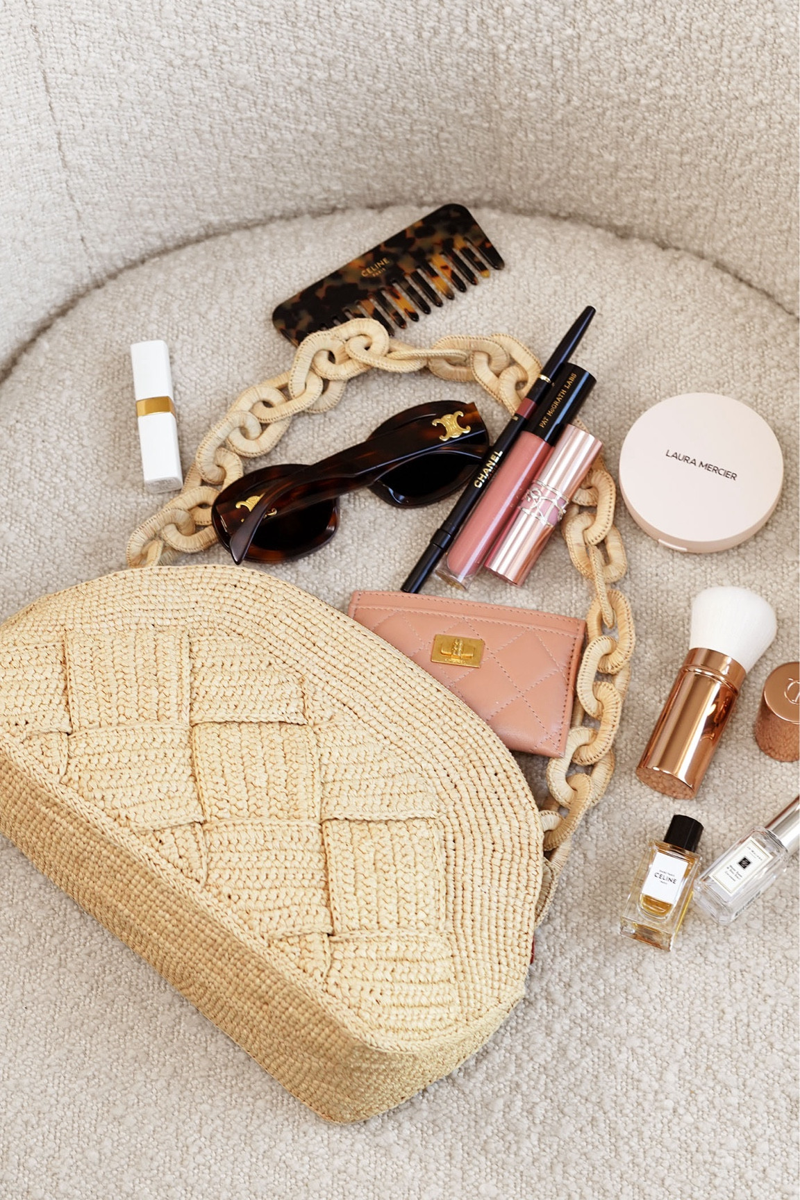 Summer bag essentials, sharing what's in my @sezane Isabelle Raffia bag

Bobbi Brown Extra Plump Lip Serum Bare Peach
Tower28 x Ouai St Barts Lip Jelly
YSL Beauty Candy Glow 44B
Mini Jo Malone Wood Sage Sea Salt + Celine Perfumes
Pat McGrath Labs LUST Gloss Nude Venus
Welovecoco Rouge Coco Balm Flirty Coral
Lip Pencil in Nude Brun
Charlotte Tilbury Retractable Airbrush
Laura Mercier Ultra-Blur Pressed Powder
Dior Beauty Le Baume
Emijay Hair Clip

What’s in my bag

#LTKItBag