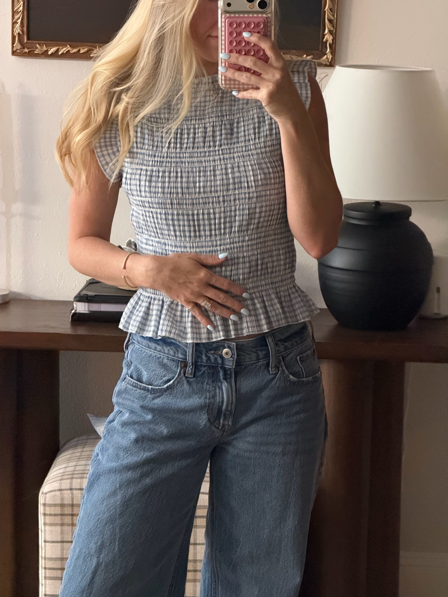 Cutest blue gingham smocked shirt can dress up with heels or down with sneakers / flats!! So cute!!!

#LTKmomlife #LTKootd