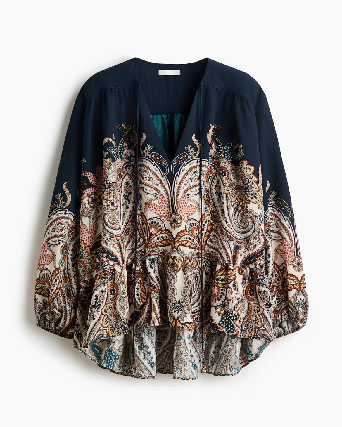 Ruffle hem patterned blouse 

#LTKSeasonal #LTKFindsUnder50