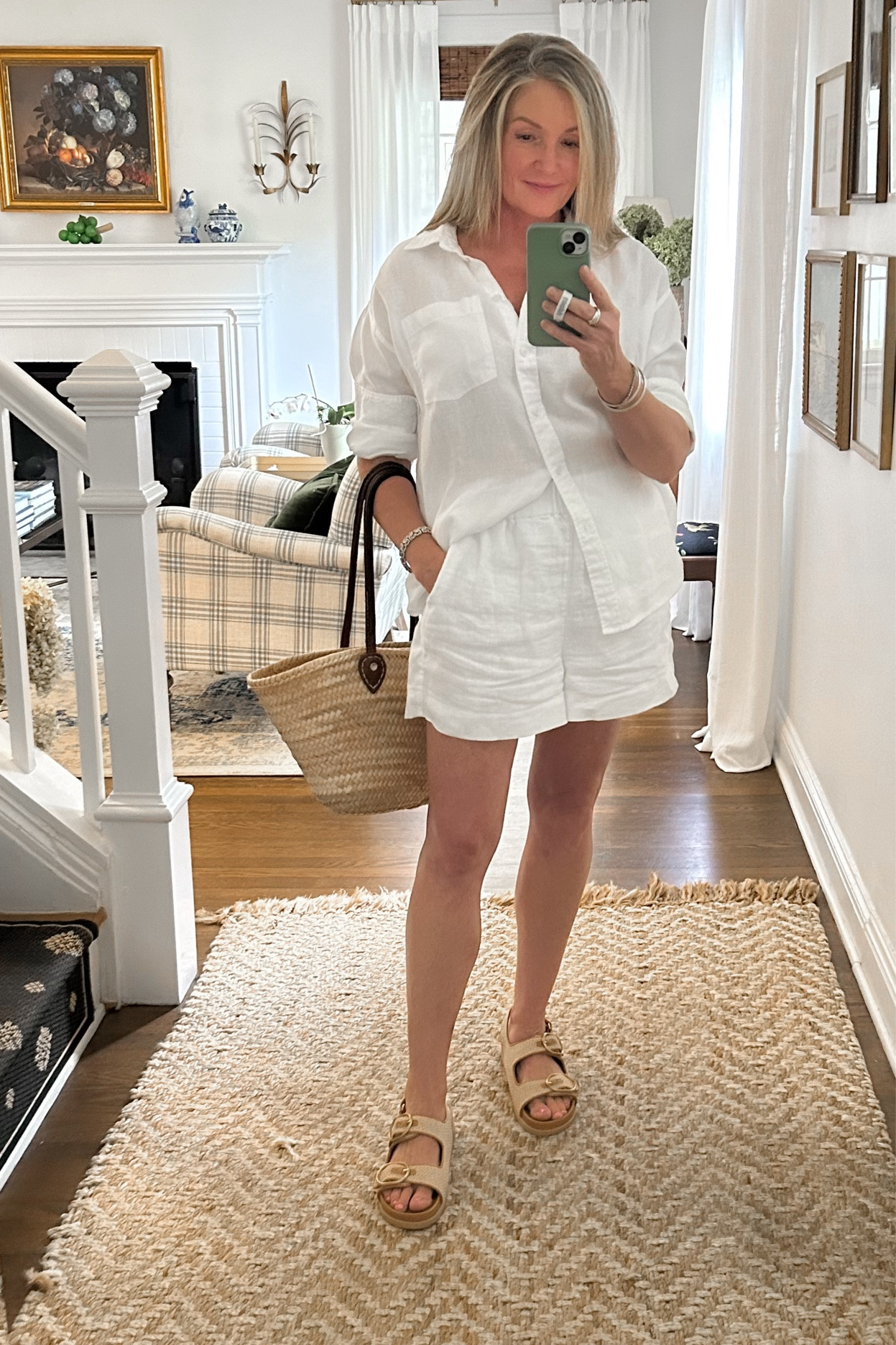 My easy breezy summer uniform.  White & linen.  The shirt is oversized so you might consider sizing down if you want it more fitted.  Shorts are tts.  Also, these raffia slides are so comfortable and run tts.  #classicstyle #summerfit 

#LTKStyleTip #LTKShoeCrush #LTKFindsUnder50