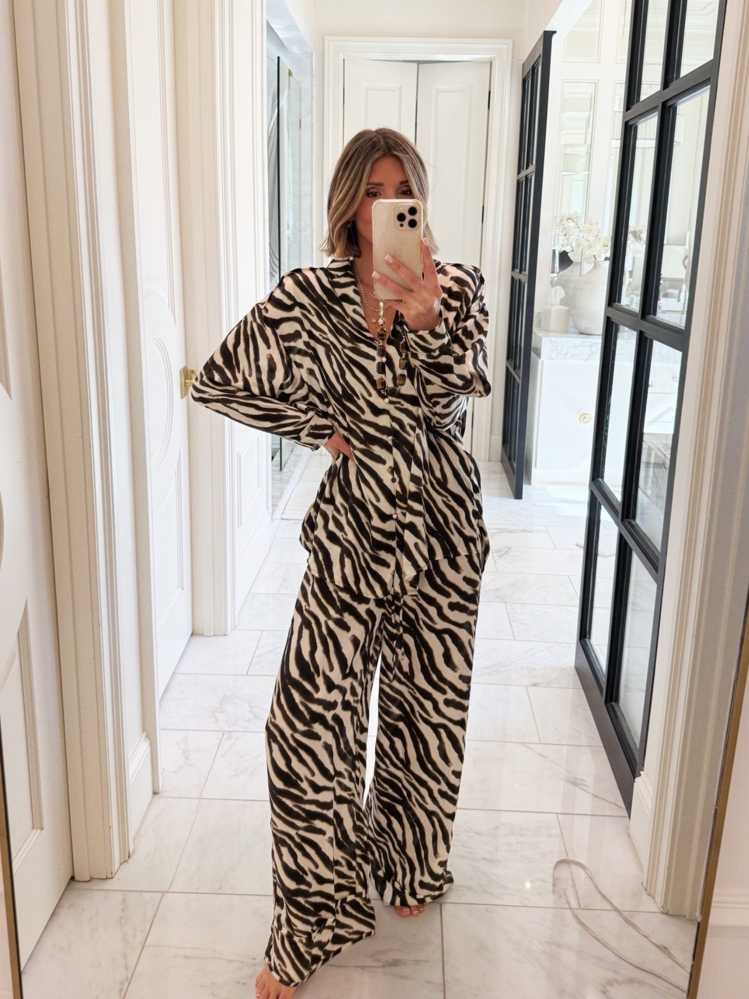 These Free People zebra print pajamas are just the cutest and so trendy right now! The satin fabric is sooo comfy too!

#LTKfall