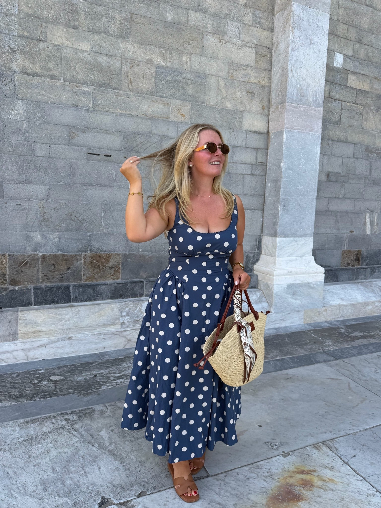 The perfect dress for an Italian summer. 🇮🇹🤍 This navy polka-dot maxi was so flattering, comfortable, and easy to wear while exploring Pisa. Styled with my woven tote, sun hat, and favorite neutral sandals.

#LTKootd #LTKgrwm #LTKTravel