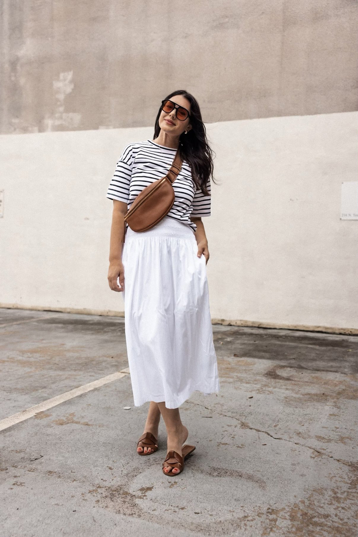 I'm in the medium of the tee -- fit is loose / boxy. True to size! 

I'm in the medium of the skirt, fit is TTS!  

 #LTKOver40 #LTKFindsUnder50 #LTKFindsUnder100