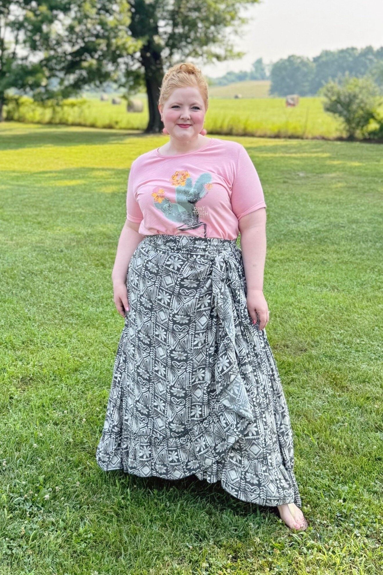 Graphic Tee and Patterned Wrap Skirt Outfit

I’m wearing this Cactus Short Sleeve Graphic Tee (sizes 12/14-32/34; $35.95) in the size 16/18 and this Wrap Look Maxi Skirt (sizes 12/14-32/34; $79.95) in the size 16/18. This cheeky tee is super lightweight for a comfortable, breathable fit in the summer heat. The skirt is a light and breezy viscose with elastic in the back of the waistband and ties to cinch your waist. This would be a super fun look for a summer concert or festival. Use code WWWULLA to shop the full look for $75.

#LTKMidsize #LTKPlusSize #LTKootd