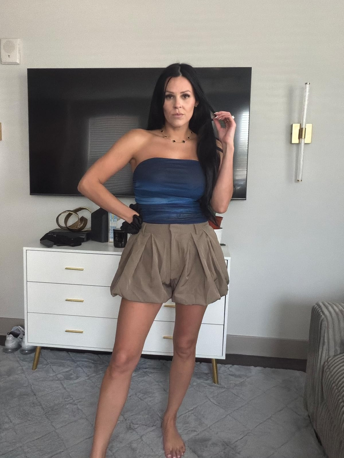 Deep blue dreams. This gradient blue tube top paired with voluminous khaki bubble shorts creates a perfectly balanced and playful summer silhouette. #SummerVibes #BubbleShorts #LTKstyletip 

 #LTKdayinmylife #LTKgrwm #LTKootd