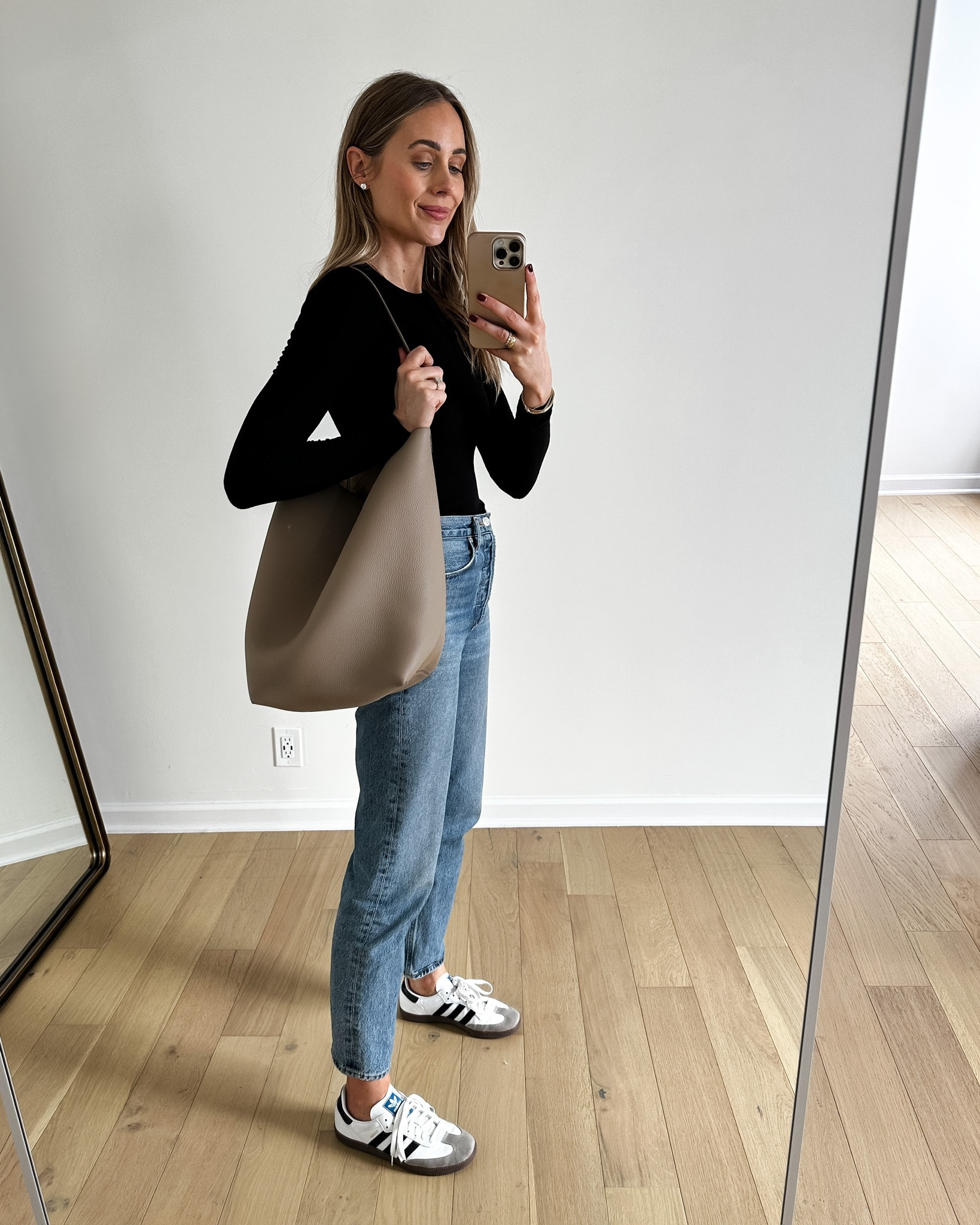 Fashion Jackson, the row park large tote (dark taupe) #handbag #sneakers #jeans 

#LTKitbag #LTKstyletip