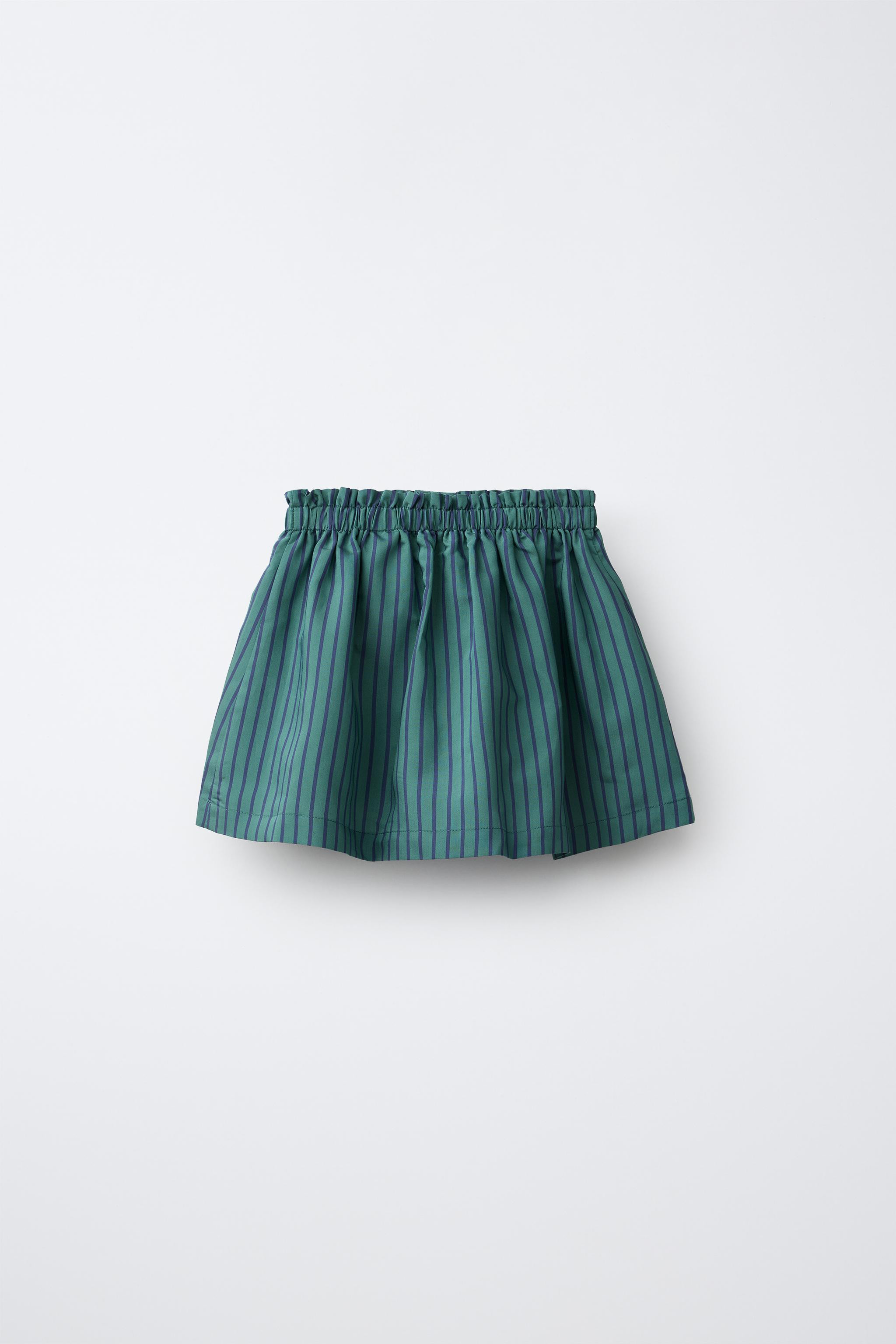 Skirt with interior shorts and elastic waistband. Front button appliqu\u00e9. Striped print. Main... | Zara US