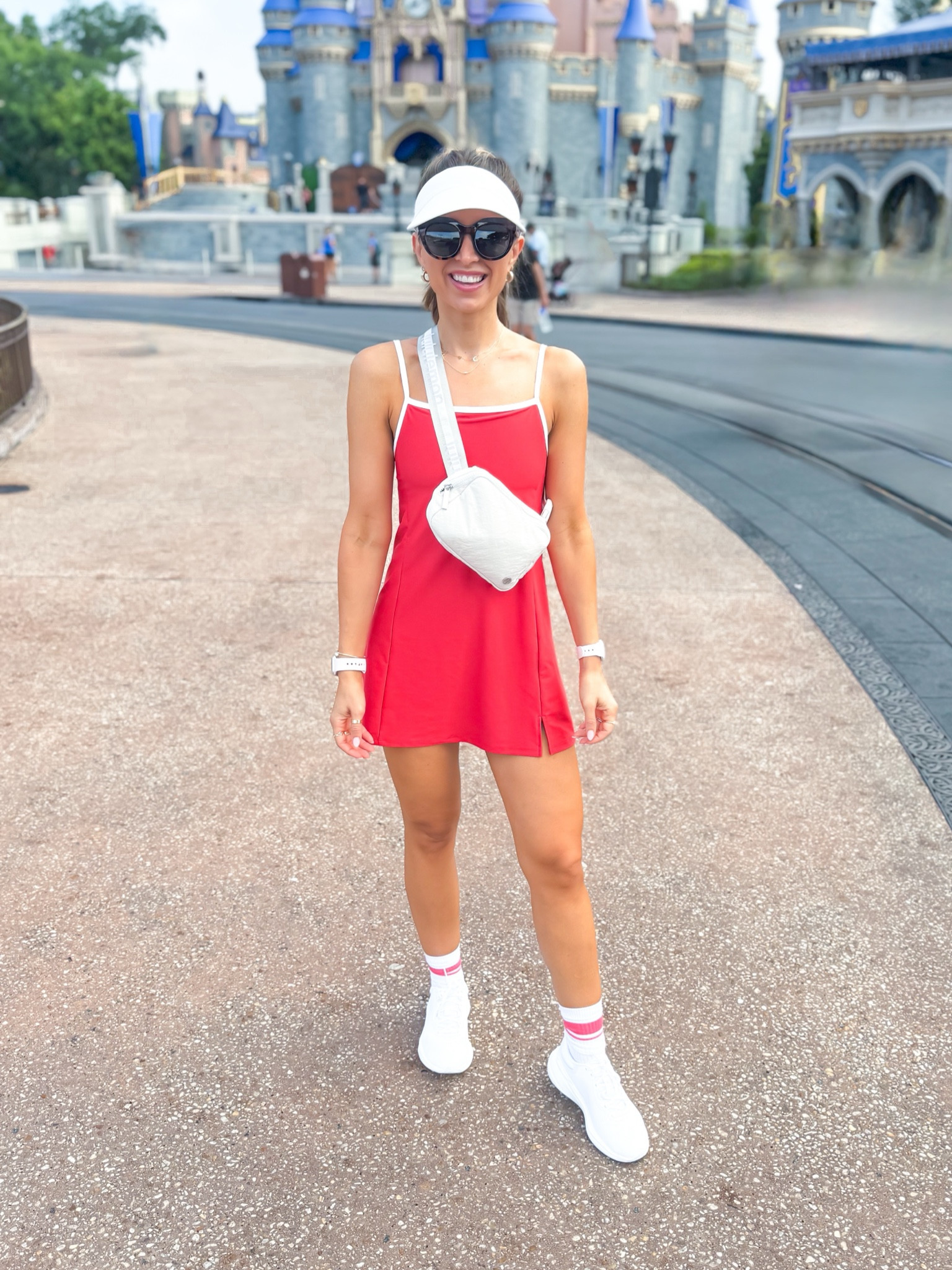 Disney outfit - what I’m wearing! Theme park outfit. Athletic dress with shorts underneath and adjustable straps in XS petite. Summer outfit. Baseball mom. Athleisure. Lululemon chargefeel shoes are TTS. White sneakers. Disney shoes. Lululemon visor. Lululemon belt bag. Initial necklaces. 

#LTKShoeCrush #LTKActive #LTKTravel
