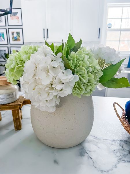 The prettiest faux hydrangeas from amazon, they are silk and so full, ordered a pack of white and green, loving the colors of them. Perfect spring home decor. 


Wedding guest dress, swimsuit, white dress, travel outfit, country concert outfit, maternity, summer dress, sandals, coffee table,

#LTKSeasonal #LTKSaleAlert #LTKHome