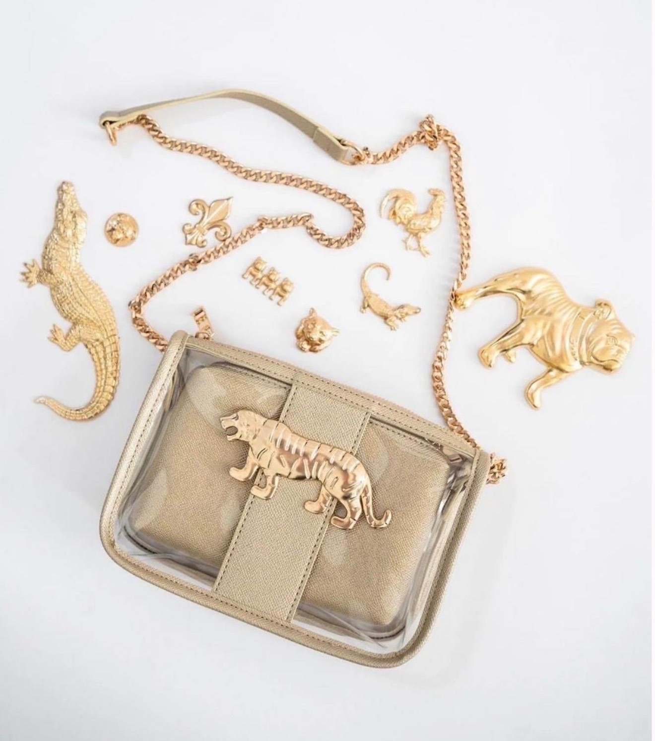 I'm all for making a clear purse cute this one is perfect and you can switch the gold mascot there's so many options!

#LTKgrwm #LTKSeasonal #LTKmomlife