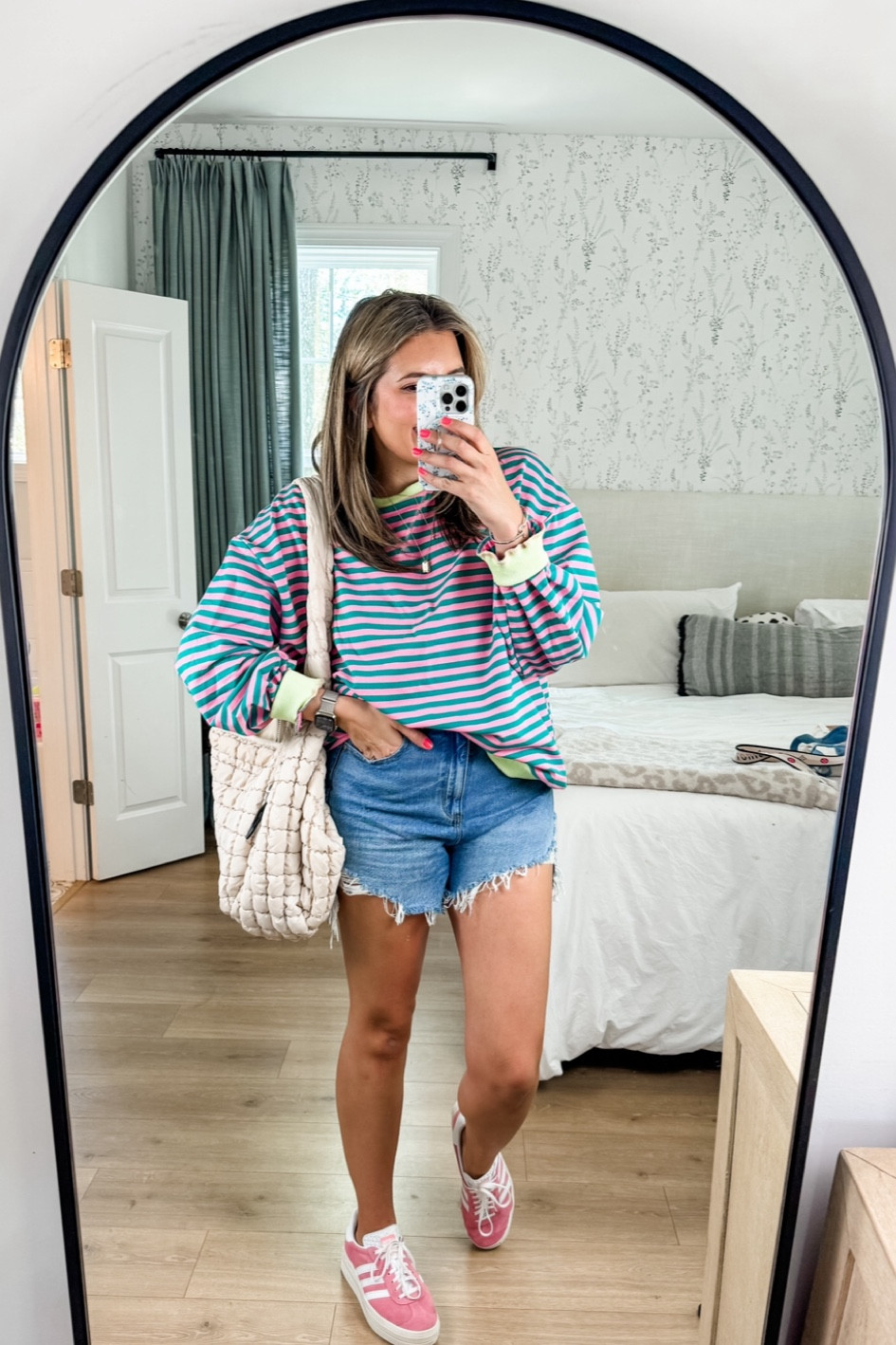 Summer outfit with free people look for less summer sweatshirt, denim shorts, and pink adidas sneakers. In a medium sweatshirt, 10 shorts, 9 sneaker. 

#LTKSaleAlert #LTKMidsize #LTKFindsUnder100