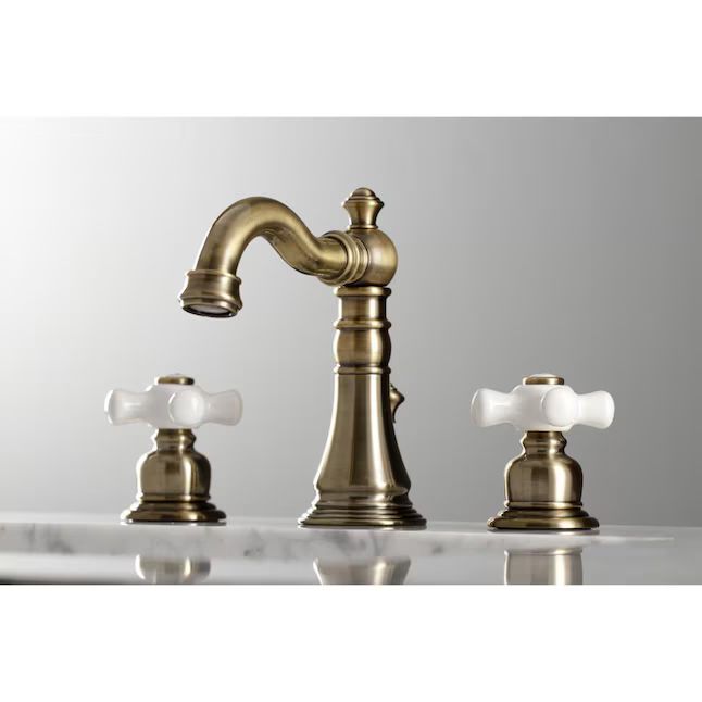 Kingston Brass  American Classic Antique Brass 2-handle Widespread Bathroom Sink Faucet with Dra... | Lowe's