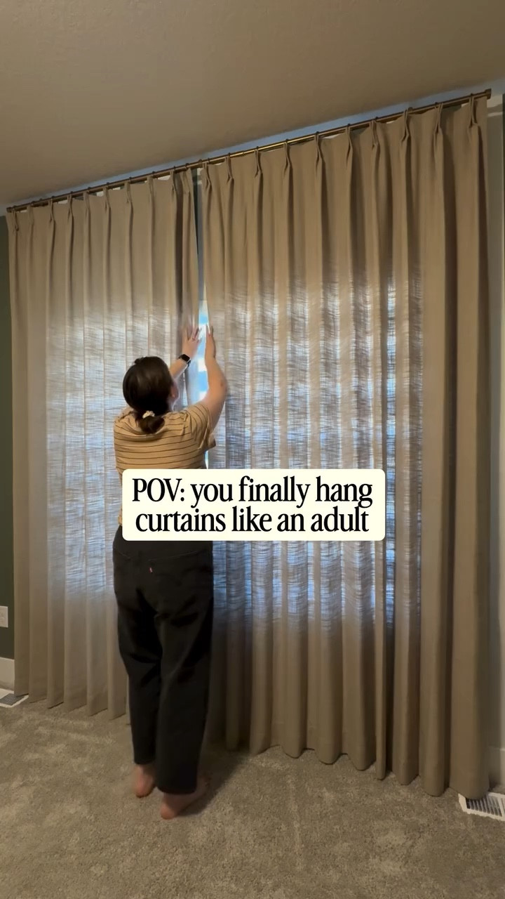 The art of hanging curtains is really simple! 

Think high and wide. 
About 6-15” past your window frame and we hang the rod slightly below the ceiling. It is the perfect formula and elongates any room almost instantly. 

Use code AFINFLUENCER to get 22%

These are the Liz Linen in Burlywood Birch from @TWOPAGES 

#twopageshome #twopagescurtains #linen #curtains 

#LTKHome