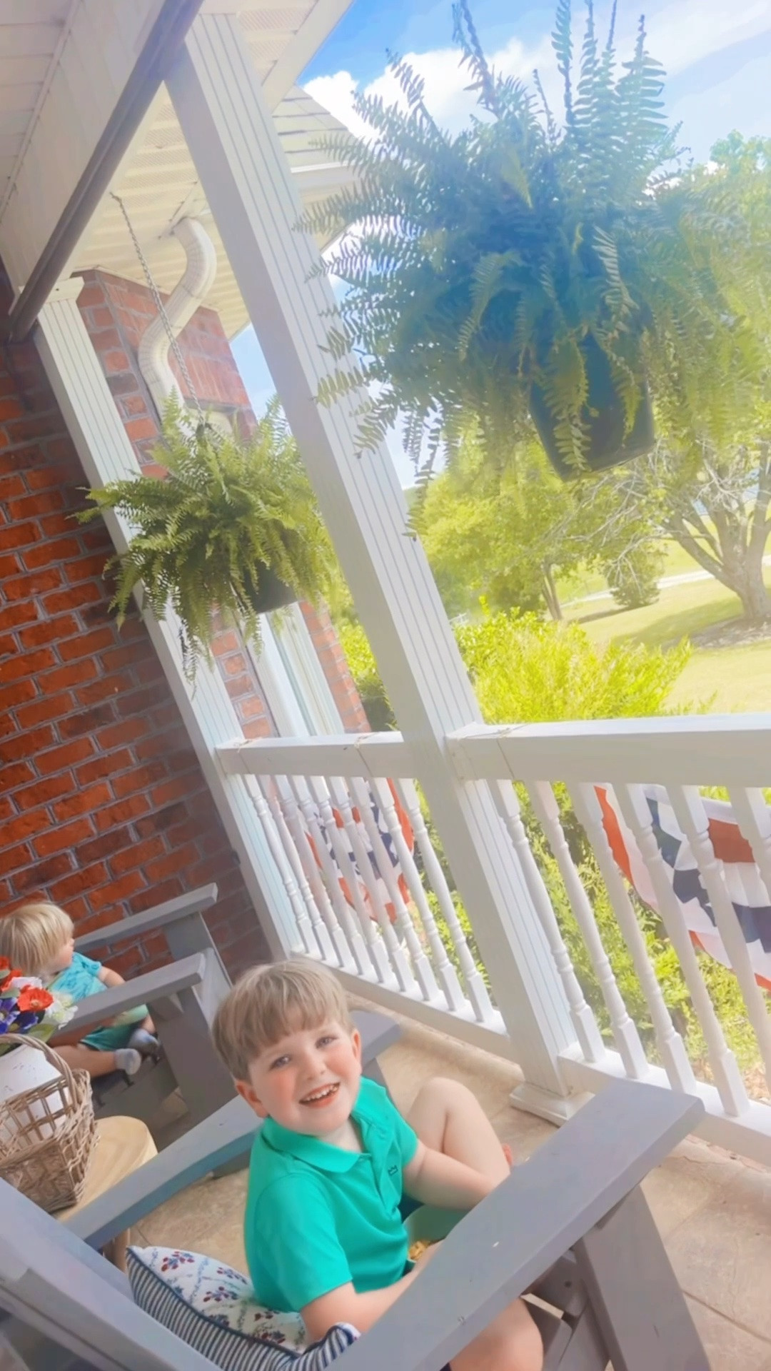 Afternoon snack time on the front porch with our favorite view 🇺🇸🌳🌾 - will never get over that the Lord saw it fit to plant our family here on this slice of heaven on earth!! ☀️