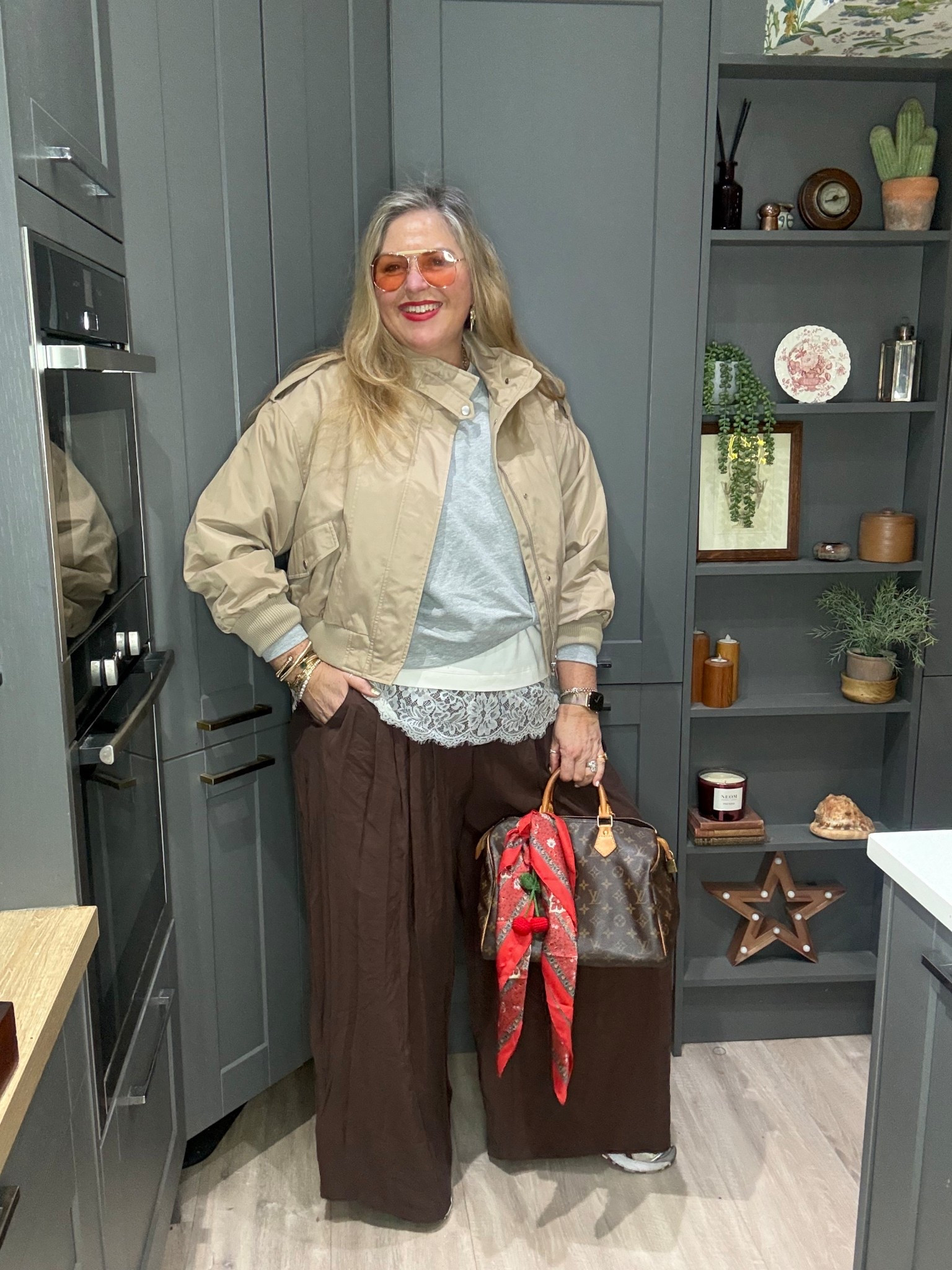 Beige jacket, grey sweatshirt, lace tshirt, brown palazzo trousers, sunglasses, brown bag 

#LTKplussize #LTKstyletip #LTKspringtrends