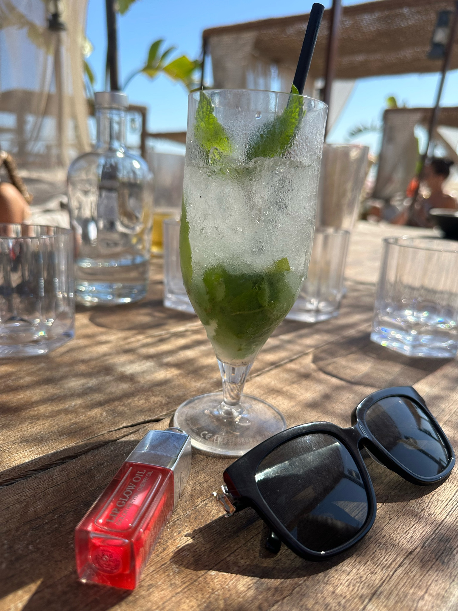 Holiday essentials 🍹🕶️💄

#dior #ysl #sunglasses #lipgloss