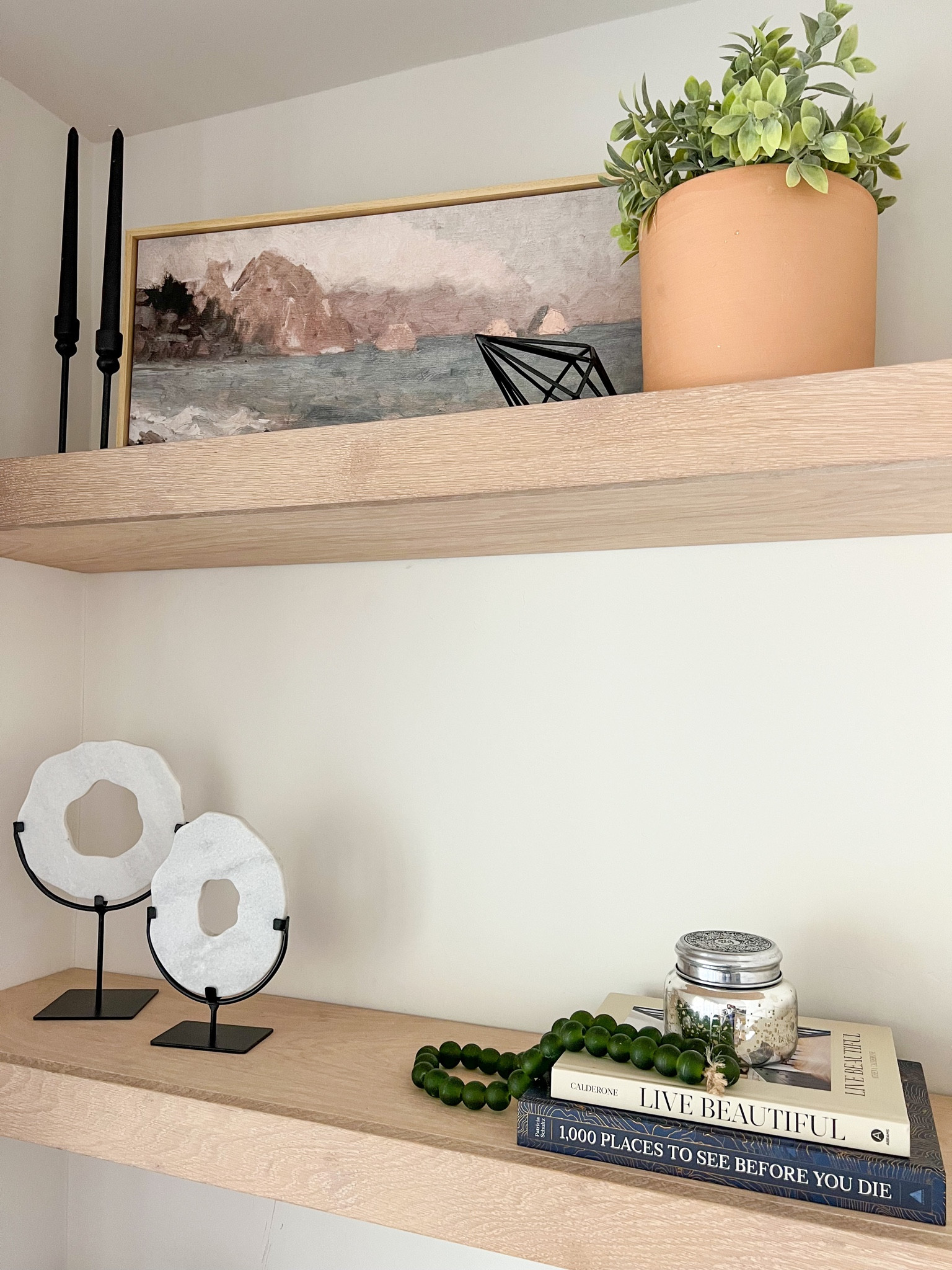 🤍 I’ve been working on our shelf styling for quite some time now… but recently received this beautiful art from @collectionprints and it’s the perfect fit for this space! So I think the top shelf is done.. 🤍

Shelf Decor
Artwork
Home Accessories 


#LTKunder100 #LTKhome #LTKGiftGuide