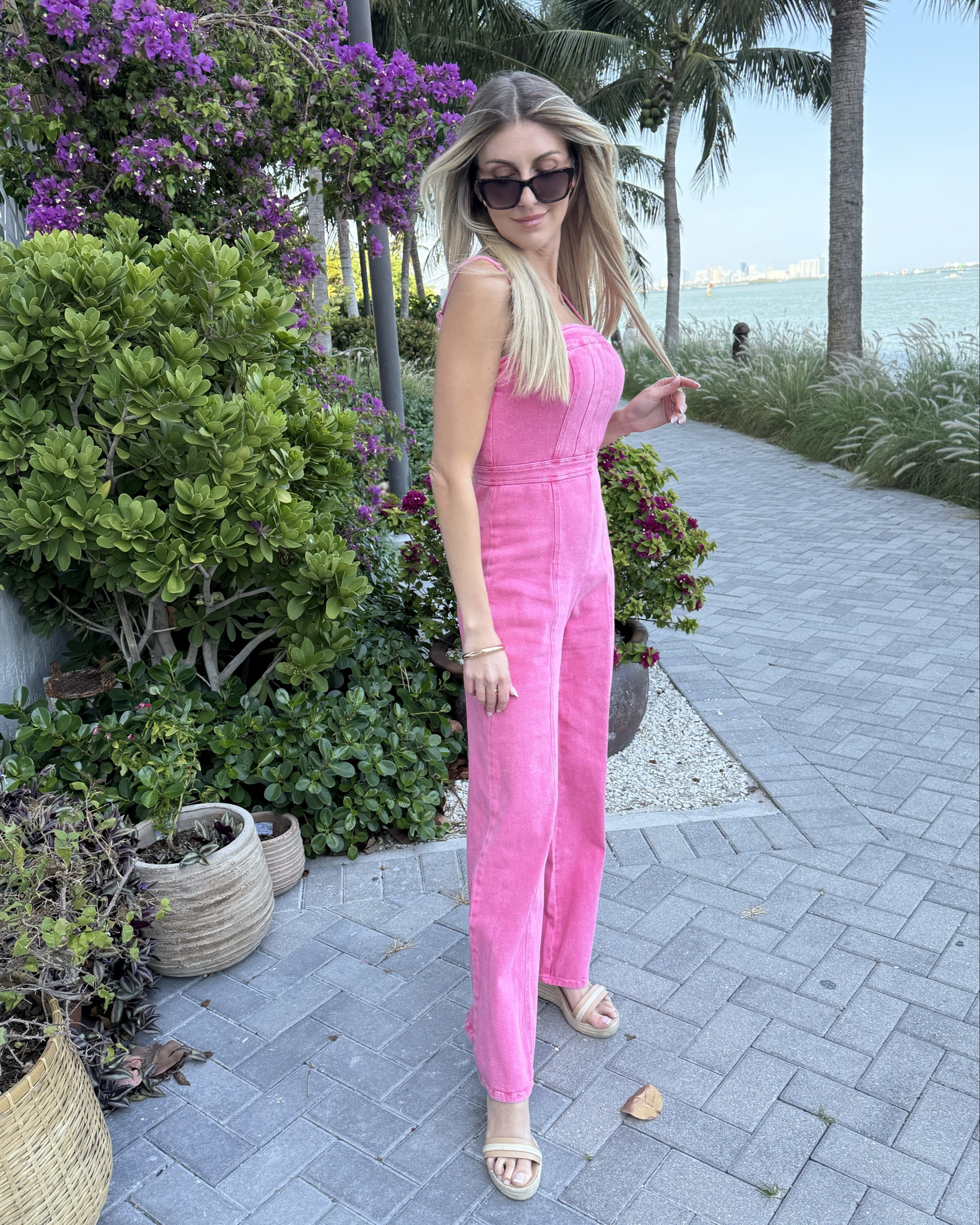 Pretty in pink! I love this pink jumpsuit from Vici. The material is so comfortable and the quality is incredible. I got so many compliments on this color as well! #pinkoutfit #jumpsuit #workclothing 

#LTKStyleTip #LTKBeauty #LTKTravel