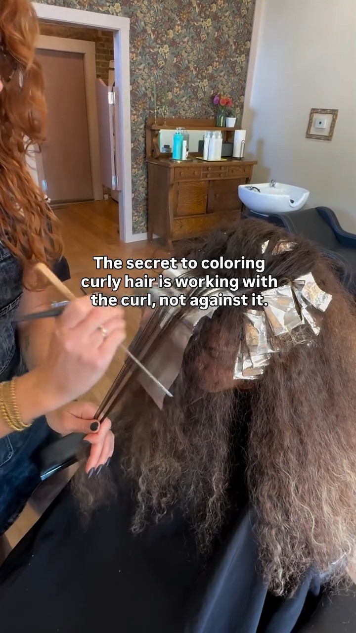 HERE’S THE SECRET ⬇️

Coloring curly hair should be done in a curl-by-curl approach.

Curly hair naturally sections itself into individual curls. USE THEM to your advantage by treating them as pre-sorted coloring sections!

Hair has memory and will likely replicate the curl patterns they create by forming those ringlets again and again with the strands around it. So doesn’t it make the most sense to use those as a guide to coloring rather than trying to section off hair traditionally and force curls into an unnatural state that could potentially cause gaps or uneven tone when the courts reform later on.

It also helps to use a lower volume developer (10-20 vol max) to avoid damaging the curl pattern. Low and slow is the name of the game here. 

Let me know what questions you have about coloring curly hair!

If you want some products that will help your curls to stay healthy after coloring, comment “COLOR-SAFE” and I'll DM you some products!
.
.
.
#haircoloringtips
#curlyhaircoloring
#curlyhairtips
#curlspecialist
#loveyourlocks