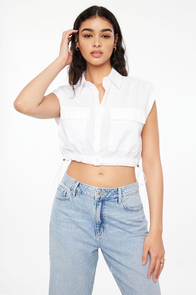 Sleeveless Cropped Button Up Shirt $49.95 | Dynamite Clothing