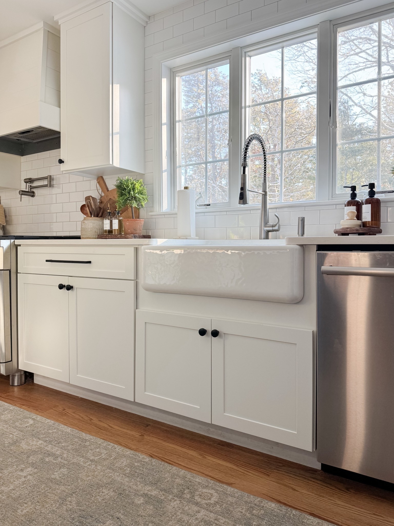 Simple countertop styling with wood accents and glass bottles creates an elevated everyday kitchen moment. coastal kitchen decor, kitchen styling ideas, oil and vinegar bottles, neutral home decor, designer inspired kitchen, coastal interiors, natural textures, kitchen inspiration, sherricalnanhome

#LTKHome