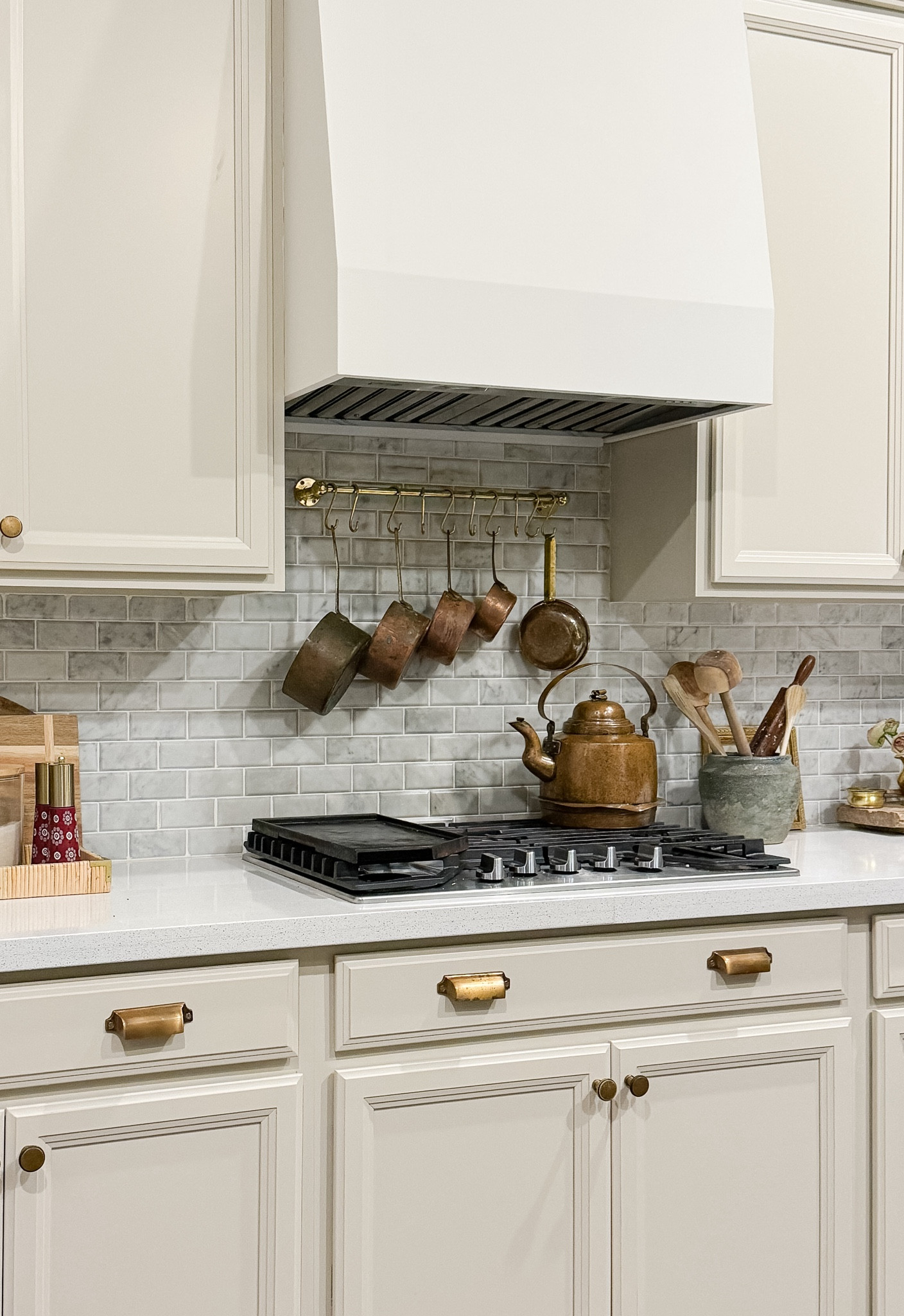 Beige brass and marble kitchen. Kitchen brass rail and copper pots and pans 

#LTKHome #LTKHoliday #LTKFindsUnder100