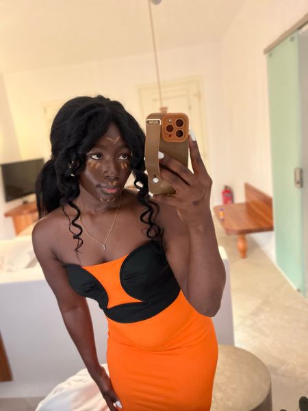 Orange dress. The top is link as well 