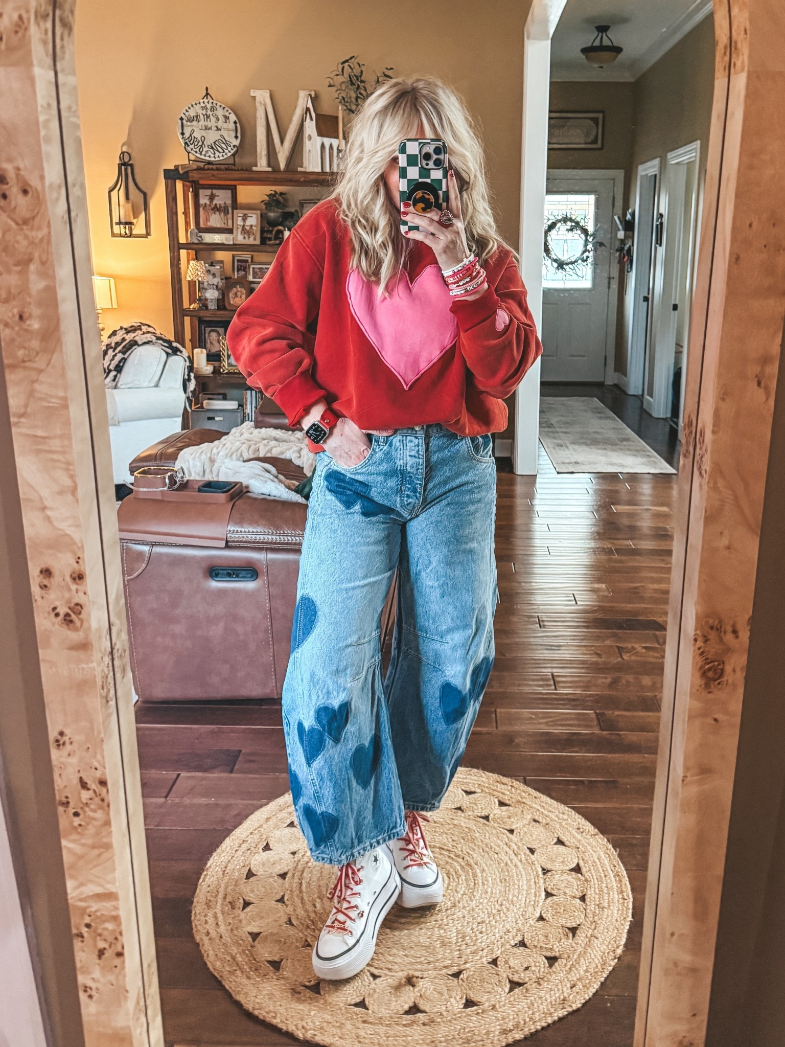 The cutest heart sweatshirt that comes in more colors! 
•Sweatshirt M
•Jeans linked some from Amazon but these are free people and not available anymore. 
•Converse sized down one 
 

#LTKootd #LTKOver40