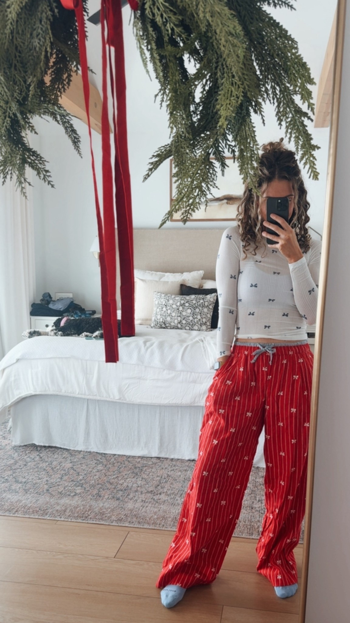 Hands down the BEST pajamas! I have been LIVING in these now for two weeks and I never want to take them off! 
I went with the extra long length and I love them! 
I would size down in the pants. 

I did a small extra long 

And medium in top! 
