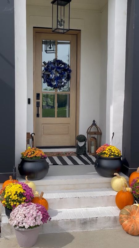 If you are soaking your mums use cauldrons instead of buckets. It looks so much better and blends with entryway decor! 

#LTKSeasonal #LTKhome #LTKHalloween