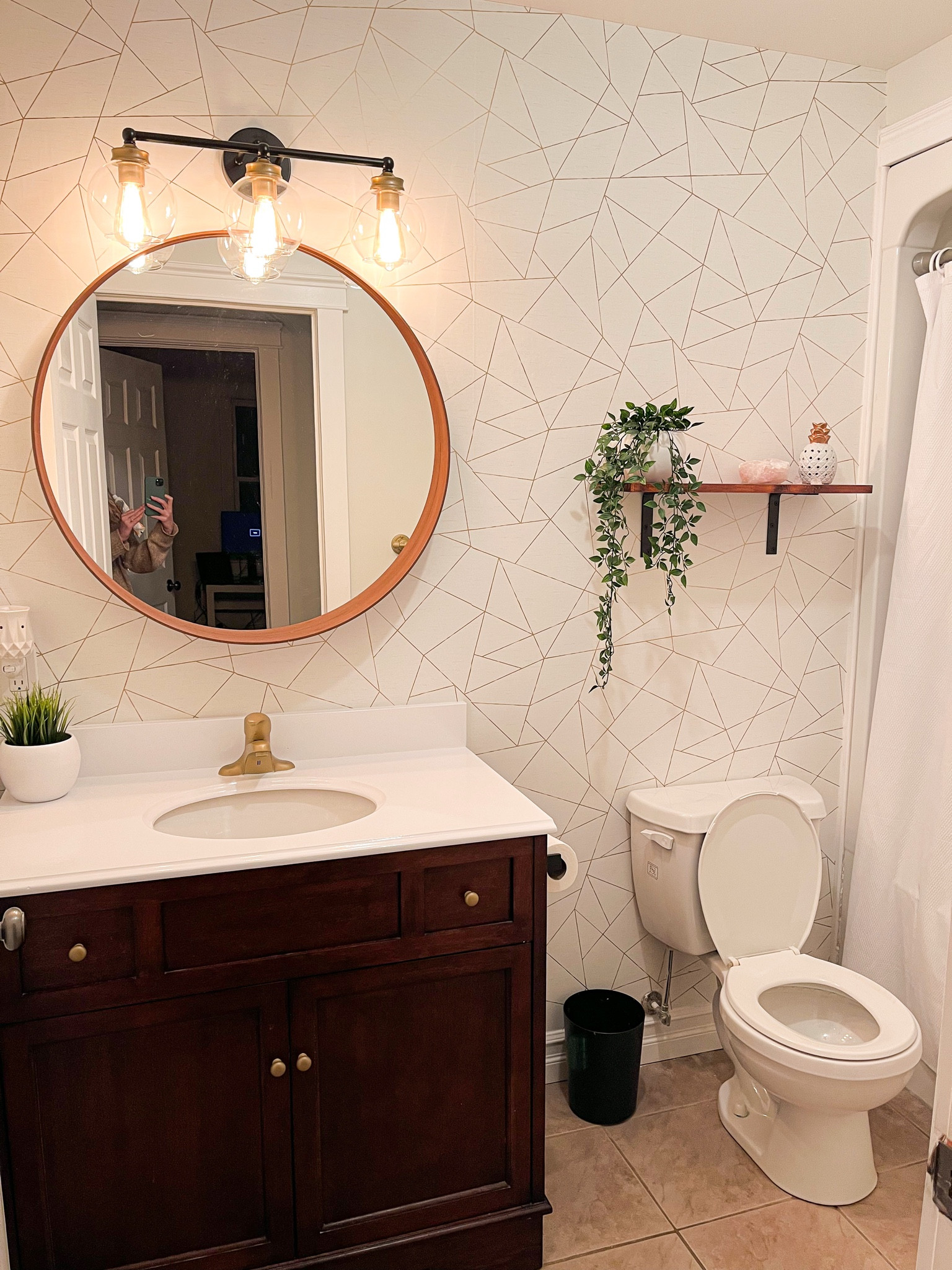 We actually did two bathroom Reno’s so the total cost was actually $425 for this one with some items being used for both. So an adjusted cost of $365 for this bathroom! If you are thinking about painting and working with what you have, do it! It makes me happy to know these items didn’t end up in a landfill ♻️ I love that you can upgrade your home without breaking the bank.  I love to share details for others. Full breakdown below 👇🏼 

Vanity light fixture $90  
Ceiling light $34.99 Ikea
Gold spray paint $16.99 Canadian Tire
Primer spray paint $11.99 Canadian Tore 
Top coat $14.99 Canadian tire used for other bathroom as well
Appliance epoxy paint $42.95 Home Depot used for other bathroom as well 
Hinges (already had)
Wood for shelf (already had)
Stain for shelf $18 Home Depot used for other bathroom as well 
Wall paper $54.99 a roll x 2 Home Depot

https://www.homedepot.ca/product/glucksteinelements-facet-geometric-white-gold-peel-and-stick-wallpaper/1001691661

Light bulbs (6 pack) $30 Home Depot half were used for other bathroom

Total cost $425 
Adjusted amount for materials used for other bathroom Reno $60.91
$364 

Cost us a total of $715 to renovate our two bathrooms! Literally the cost of one new vanity ♻️ I love both as they are different vibes but still go with the aesthetic of our home 🥰 which is your favourite? (Check out my other video to see the other bathroom)


#LTKcanada