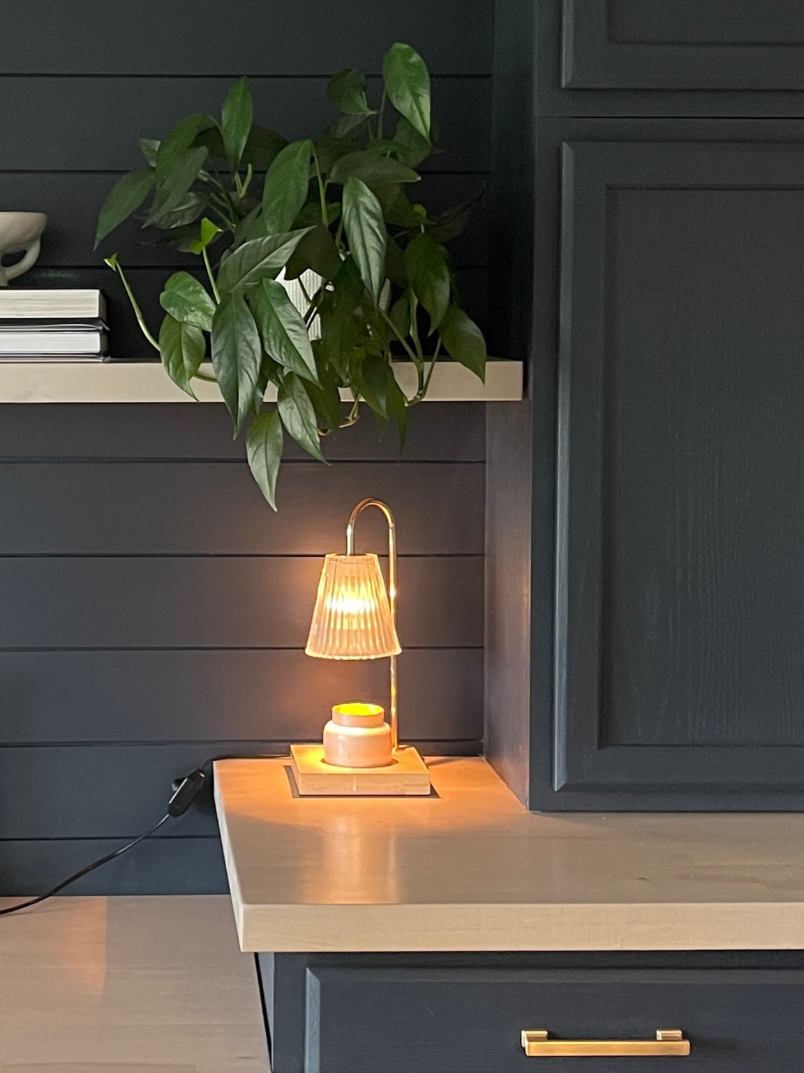 Moody home office vibes. This candle warmer gives off the most amazing warm glow 💛 linking the exact candle warmer I have, along with similar ones and some of my favorite candles.

Candle warmer, Amazon find, opened shelves

#LTKFind #LTKunder50 #LTKhome