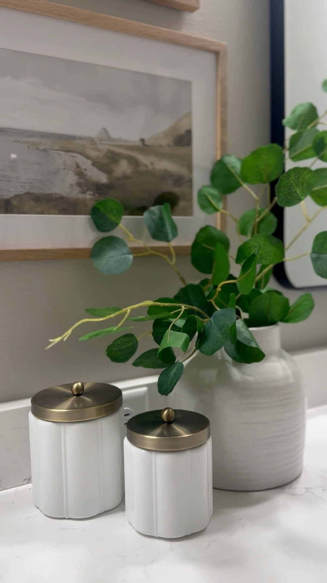 Sharing my favorite bathroom decor and these cute frames!

Download tons of affordable artwork on Etsy — upload onto Walgreens photo — do same day pickup!

I use poster prints for larger frames and regular matte photo sizes for smaller prints.

Use Velcro command strips on back of frames to easily hang artwork without damaging your walls!

These are my favorite faux eucalyptus. They look so real. Cut stems apart and put into vase at different lengths!

Bathroom decor, bathroom ideas, bathroom design, counter decor, containers, frames and prints, best stems, faux stems, vases, design ideas

#LTKHome