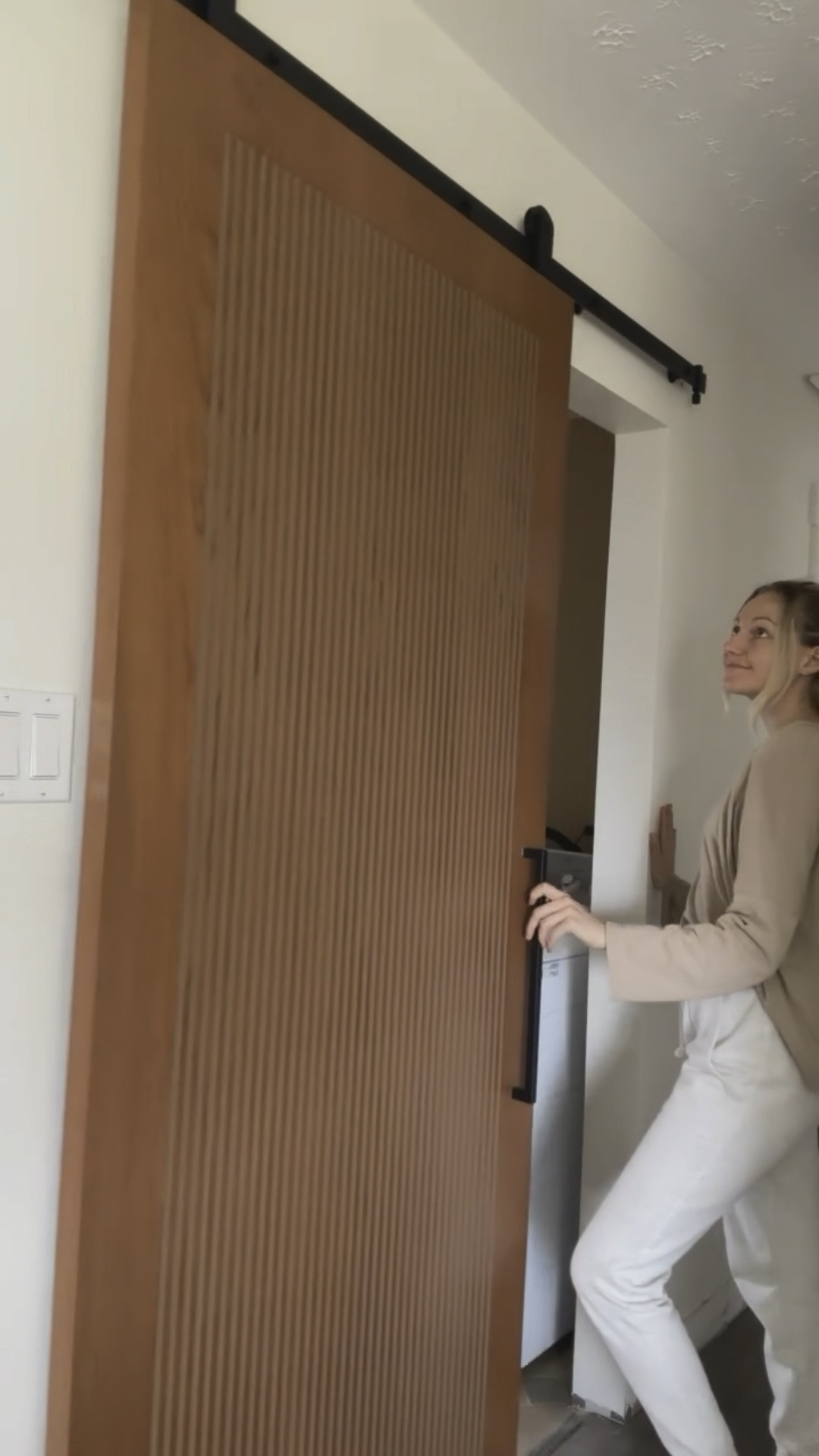 If you’re looking to save space a sliding door is a great option. The install was annoying but worth the added space in our laundry room. I also love how this one is modern and ties in well with the rest of the hallway renovation

Doors color: Shiitake by @sherwinwilliams
Wall color: Dover White by @sherwinwilliams
Door handles: @explorehardware 
Barn door: @homedeporcanada


#homerenovationinspiration #moderncontemporaryhome #earthyorganic #hallwayrefresh #doorhandles 

#LTKhome #LTKcanada