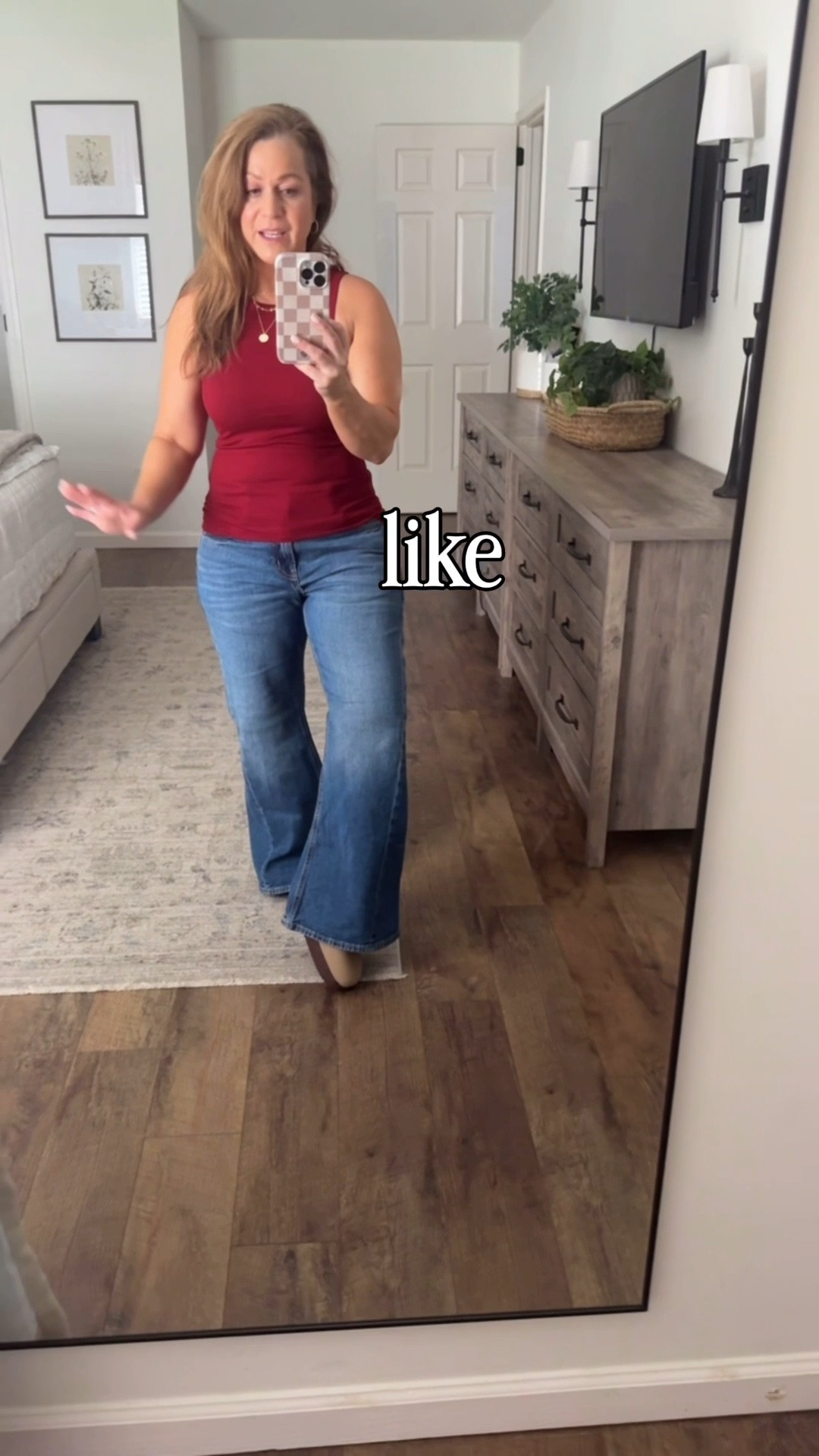 NEW jeans from @oldnavy 
Mid rise twisted hem relaxed flare 
Three inseam options 
Extended sizing 

I wear a 6 petite 
And am in a small in the tank

#LTKPetite #LTKOver40 #LTKSaleAlert