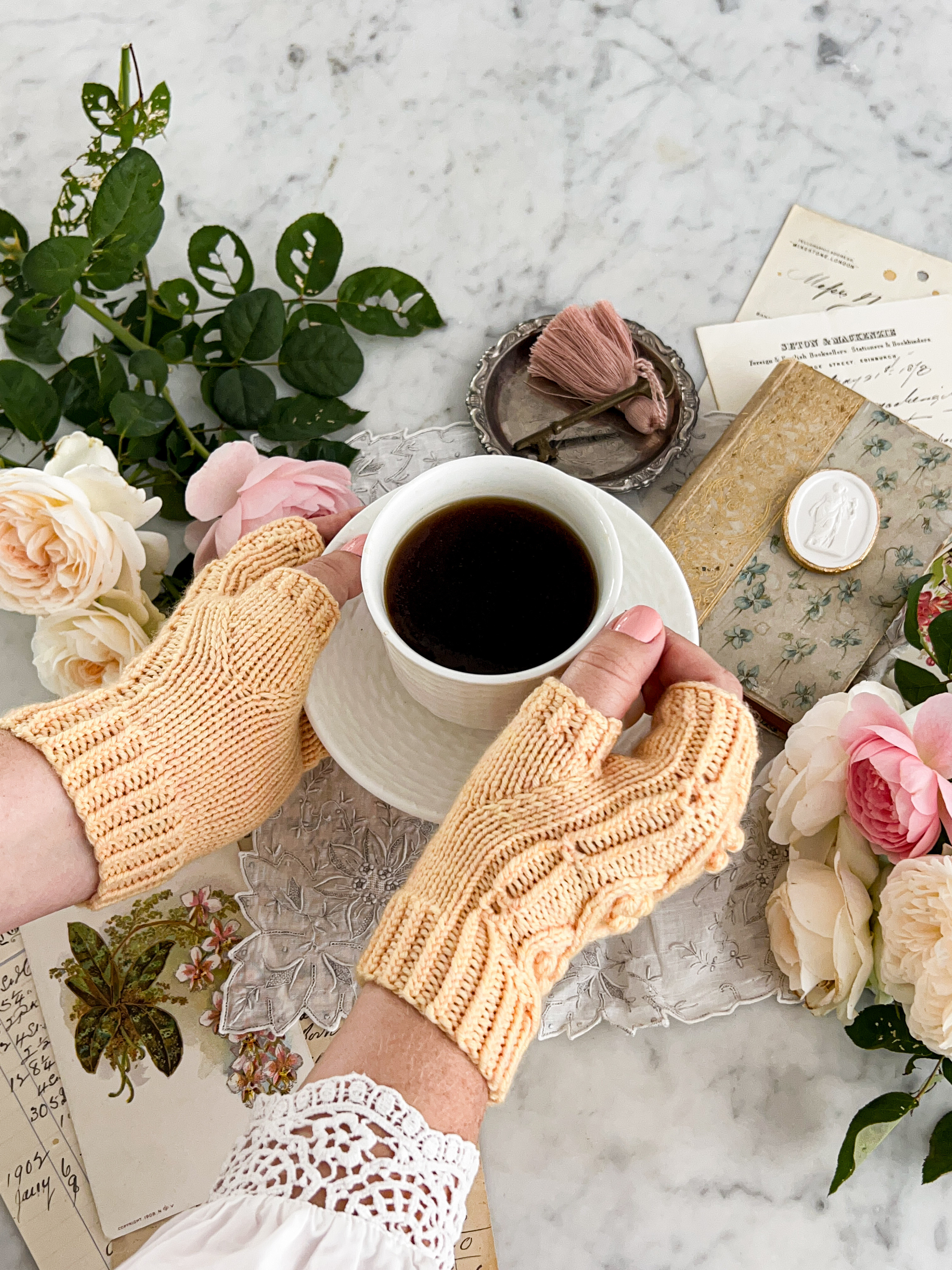 Hot coffee and fingerless mitts keep my hands warm on extra chilly days. Throw in some antique botanical prints and an antique book, and that's a recipe for a party. 

 #LTKHome #LTKFindsUnder50 #LTKFindsUnder100