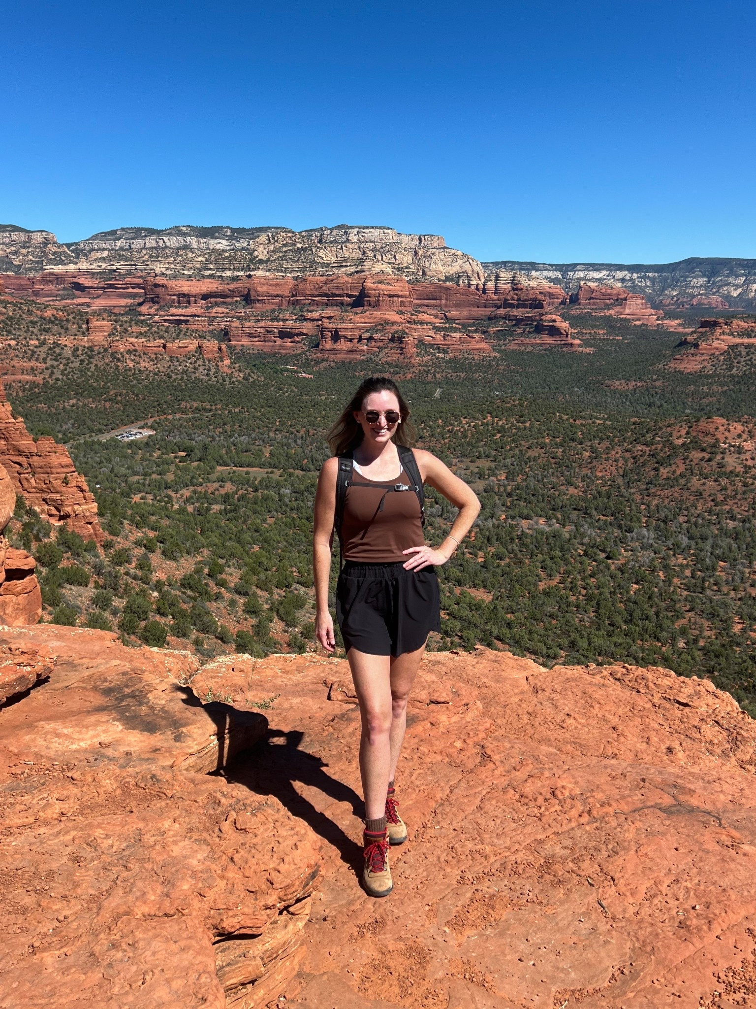 Affordable fall transition hiking outfit. Sedona hiking outfit. Brown lulu dupe workout tank (sized up to L) with black active shorts, comfortable hiking boots, hiking backpack

#LTKActive #LTKTall #LTKTravel
